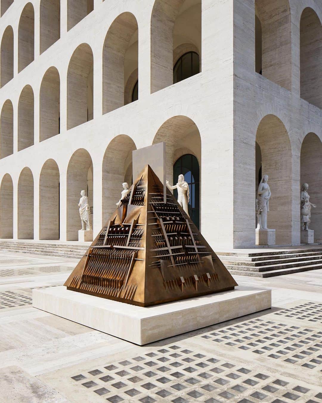 Fendiのインスタグラム：「Fendi is proud to host "Arnaldo Pomodoro: The Great Theatre of Civilizations" at Palazzo della Civiltà Italiana, Fendi headquarters in Rome, 12 May - 1 October 2023.  The exhibition is part of a partnership evolving from the relationship established between @fondazione_arnaldo_pomodoro and the Maison when Fendi established its Milanese headquarters in the foundation's former exhibition venue. #lartedidiffonderelarte」