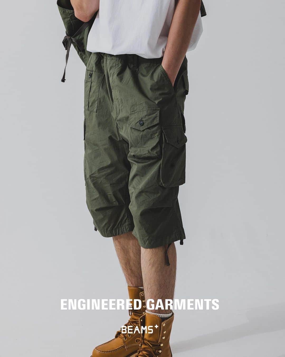 BEAMS+さんのインスタグラム写真 - (BEAMS+Instagram)「… ENGINEERED GARMENTS × BEAMS PLUS 『BDU 3/4 Shorts』 7.1（Sat.）Release  The "Jungle Fatigue Pants" were custom-designed by "ENGINEERED GARMENTS" designer Daiki Suzuki and sold out in the blink of an eye during the 22SS season. The pocket work and 3/4 length are reminiscent of the story of that time. This season, the pants are available in three materials: olive cotton poplin, ripstop navy, and military denim, which was very popular in the previous season.  -------------------------- . 22SSシーズンに瞬く間に完売を博した〈ENGINEERED GARMENTS〉デザイナー鈴木大器氏によってカスタムデザインされた『ジャングルファティーグパンツ』。 当時のストーリーを彷彿とさせるポケットワークと3/4レングスが魅力。 今シーズンは、コットンポプリンを採用したオリーブ、リップストップのネイビーに加え、前回人気の高かったミリタリーデニムの計3素材を展開。 . @engineered_garments_official @beams_plus @beams_plus_harajuku @beams_plus_yurakucho #engineeredgarments #beamsplus」6月27日 18時00分 - beams_plus_harajuku