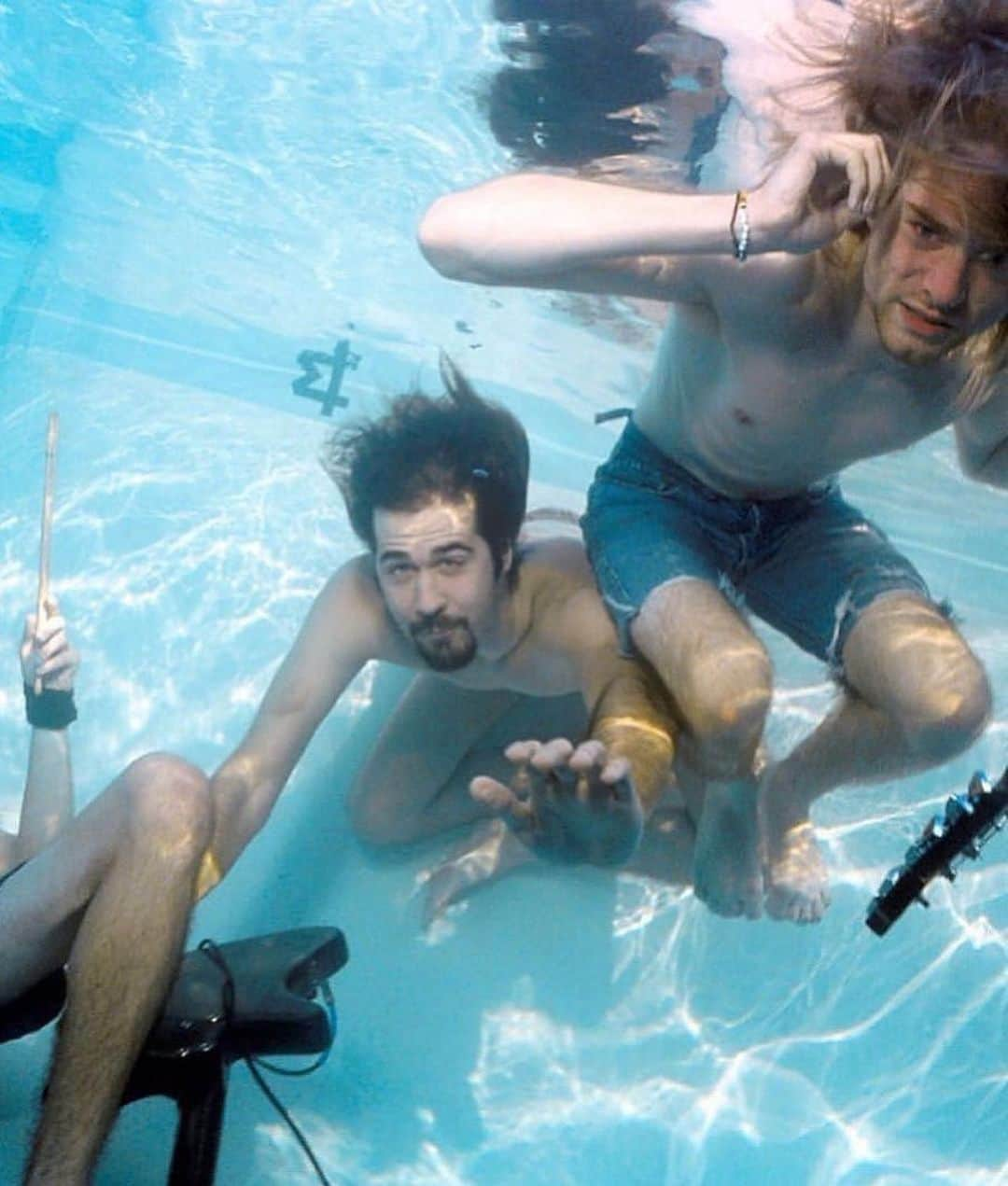 StreetArtGlobeさんのインスタグラム写真 - (StreetArtGlobeInstagram)「A rare behind the scenes shots of Nirvana's 'Nevermind' album cover (1991).   In September 2022, the now 31 year old baby featured on the cover lost his lawsuit claiming that the image constituted child sexual abuse.  In the suit, Spencer Elden claimed the album cover, which depicts him at four months old and was taken by a family friend, caused him “permanent harm” and a “lifelong loss of income-earning capacity”.  The family were originally paid $200 for use of the image. Elden’s suit claimed: “Defendants knowingly produced, possessed and advertised commercial child pornography depicting Spencer.”  Elden said that as a child, he had been unable to consent to the photo being used and sought $140,000 in damages.  US judge Fernando Olguin dismissed the case with prejudice, ruling that it was filed past the 10-year statute of limitations.  Elden first filed against Dave Grohl, bassist Krist Novoselic, Courtney Love and the estate of Kurt Cobain, photographer Kirk Weddle and several record labels in 2021. The suit was thrown out after he missed a deadline to respond to the defendants’ motion to dismiss, which described Elden’s claim as “not serious”.  ‘The cover is supposed to be provocative’: the daunting task of redesigning Nirvana’s Nevermind. It continued: “A brief examination of the photograph, or Elden’s own conduct (not to mention the photograph’s presence in the homes of millions of Americans who, on Elden’s theory, are guilty of felony possession of child pornography) makes that clear.”  A defence lawyer welcomed the ruling, describing the case as “meritless”. The defendants had previously argued that Elden had “spent three decades profiting from his celebrity as the self-anointed ‘Nirvana Baby’”, including recreating the image for the album’s 15th and 25th anniversaries. Elden also has a tattoo of the word Nevermind on his chest.  In 2015, Elden told the Guardian: “It is a weird thing to get my head around, being part of such a culturally iconic image. But it’s always been a positive thing and opened doors for me. I’m 23 now and an artist, and this story gave me an opportunity to work with Shepard Fairey for five years, which was an awesome experience.”」6月23日 22時00分 - streetartglobe