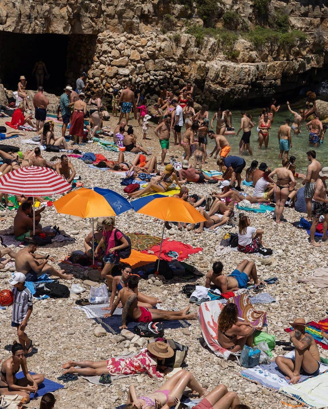Samuel Lippkeのインスタグラム：「Polignano A Mare for the week. This beach was packed, the water was perfect for cliff diving but hard to relax with soo much energy. This is the beach they do the annual Red Bull cliff diving competition (which we are setting up for now.) Great little town and sooo much gelato and pizza for us. #thelippkes #poliganoamare」