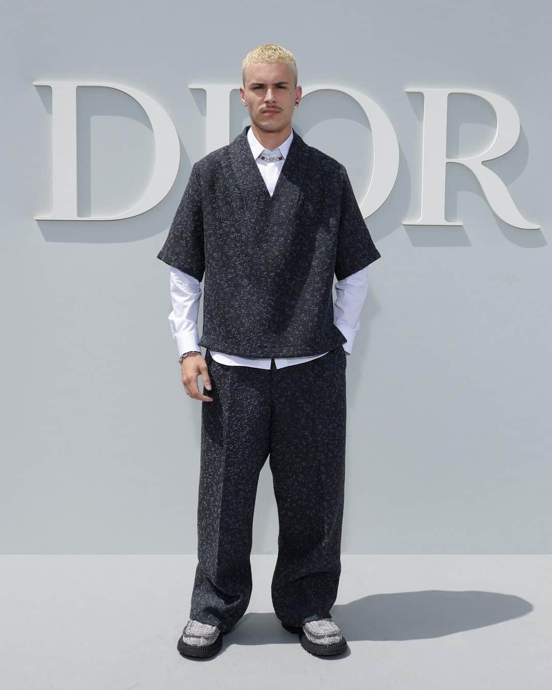 のインスタグラム：「In a tweed-focused look from the new collection by @MrKimJones, actor @Aron.Piper was joined on the front row at the #DiorSummer24 show by #StarsinDior including @JoaoGuilherme and @LoyleCarner.」