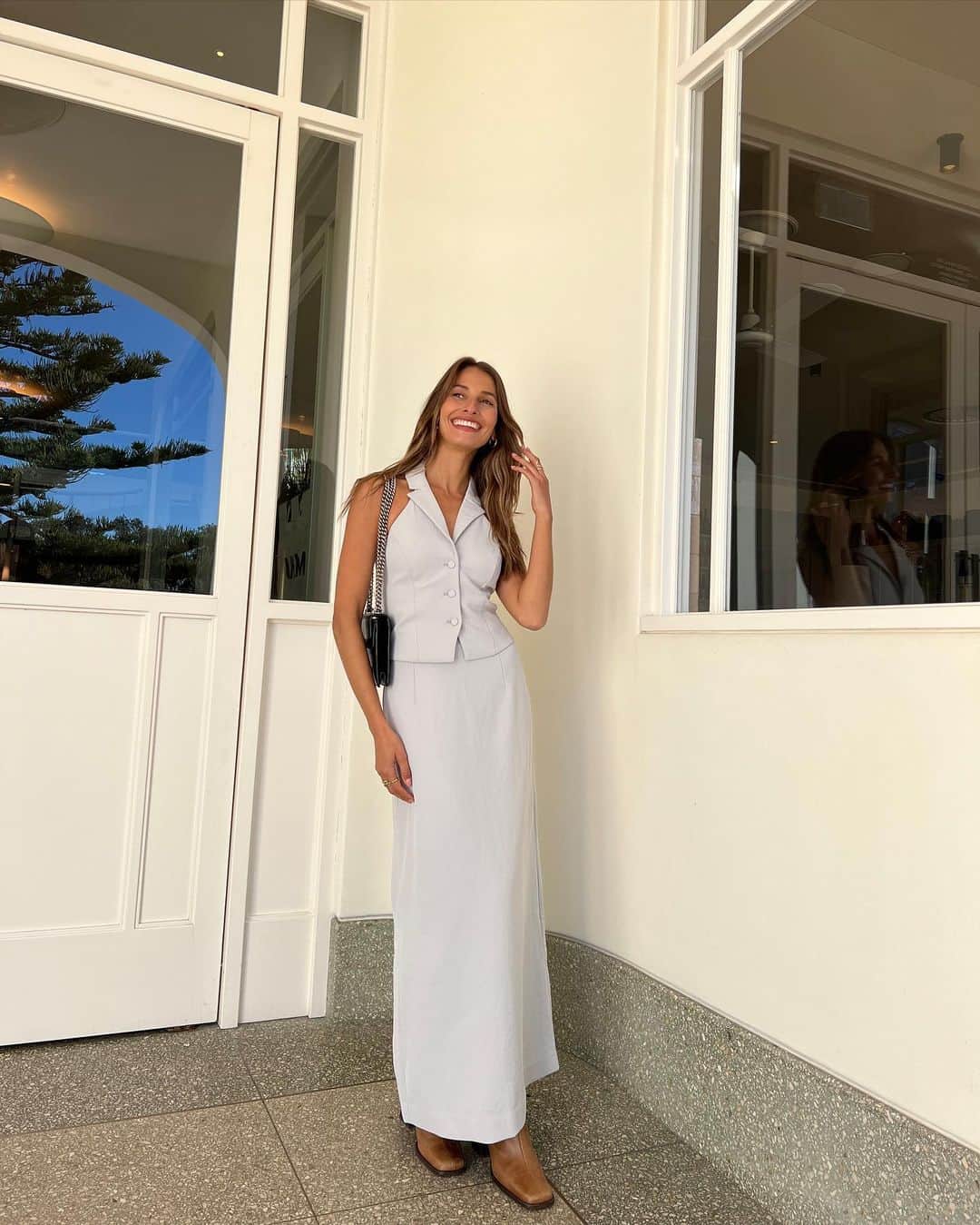 KOOKAI のインスタグラム：「We love @dominiquelissa in the Ariel Staple Vest & Midi Skirt •• Shop the look in boutiques and online #kookai」
