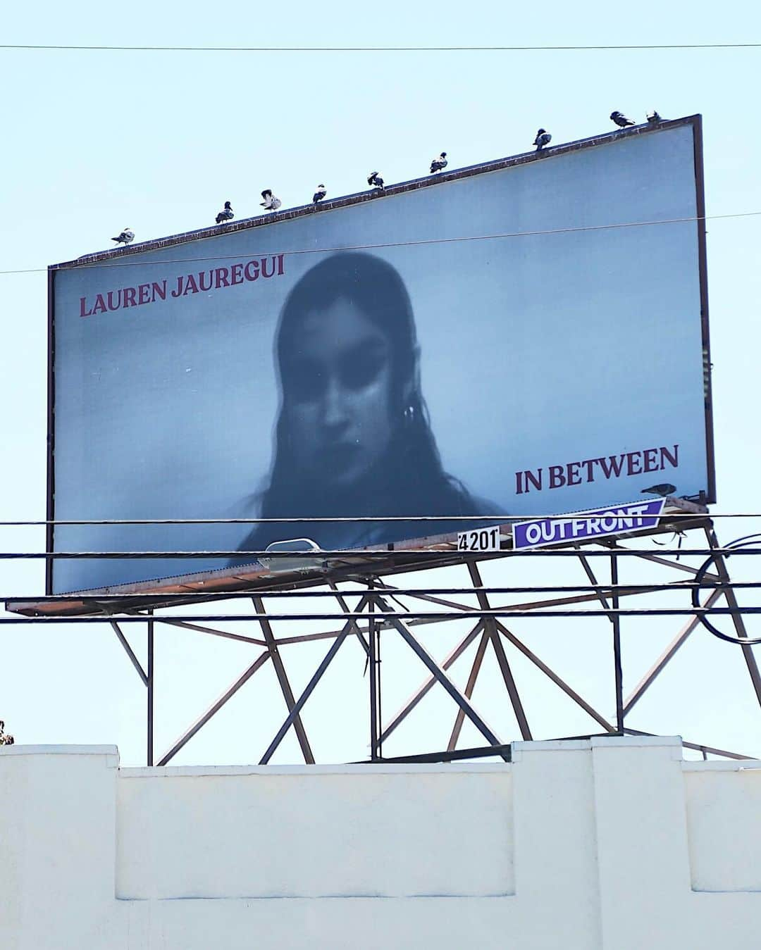 ローレン・ハウレギのインスタグラム：「My first billboard ever is up in Los Angeles😭 its in Silverlake at the cross of W Sunset Blvd and Parkman Ave🥰 of course when I’m out of town but either way I’m so fucking grateful I could cry..and did when I received these pictures from @aodream & @laurenelizadunn 🥰 if you pass by her give her some love for meee✨✨✨ #InBetween out now everywhere you listen to music🕊🌱」