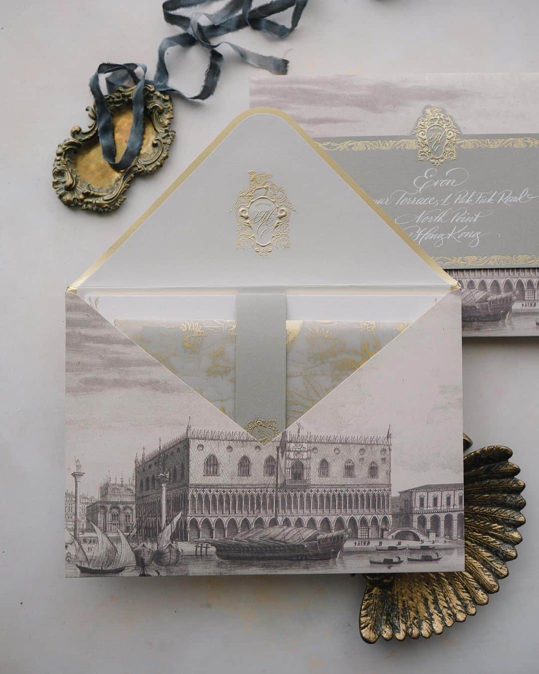 Veronica Halimのインスタグラム：「Experience a world of elegance and opulence with this invitation suite, meticulously crafted for a wedding at the iconic Palazzo Pisani Moretta in Venice. Every card piece showcases intricate designs, capturing the timeless allure and romantic essence of Venice's antique charm. —  #palazzopisanimoretta #destinationwedding #venicewedding #venetianwedding #truffypi  #カリグラフィースタイリング  #weddinginvitation #weddingstationery  #embossed  #paperlovers #ウェディング #ウェディングアイテム #カリグラファ #veronicahalim #スタイリング #prettypapers #weddingsuite #venice #amanvenice」