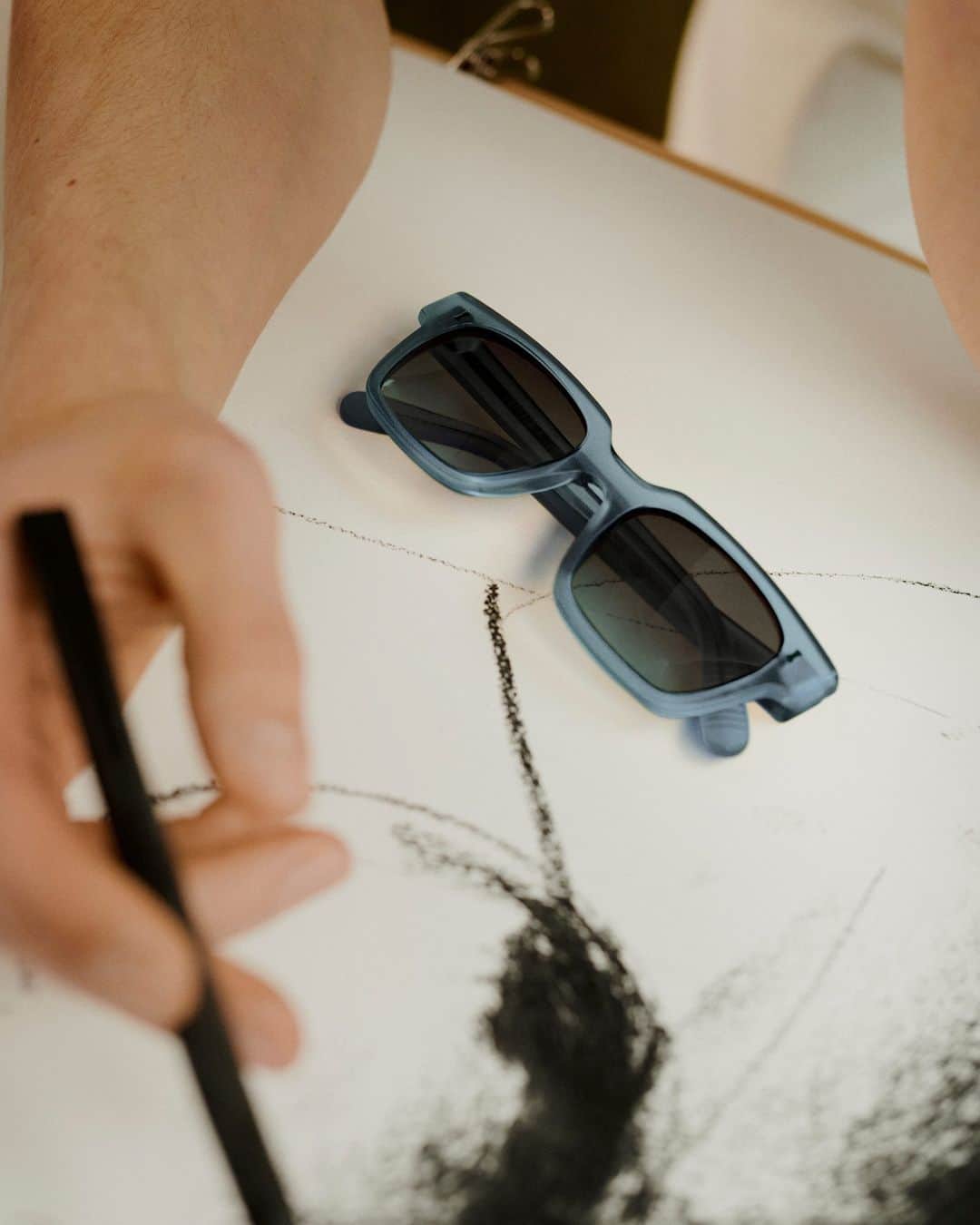 MR PORTERのインスタグラム：「Summer is all about lifting your mood by embracing some colour into your wardrobe - and that extends to your accessories, too. These sleek square frames from the @mrp x @cubitts collection are made from a blue acetate that will add a subtle pop to your outfits.  Tap to shop and head to the bio to discover the full collection.」