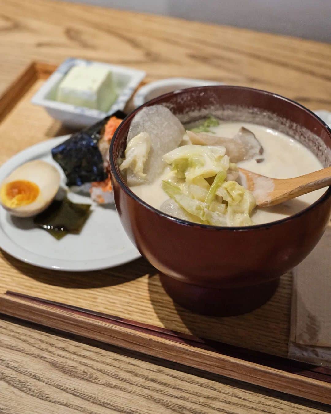 Erinaさんのインスタグラム写真 - (ErinaInstagram)「This place is beyond adorable, serving a delightful Onigiri + Miso Soup set🍱  We ordered the -Tonjiru set  -Soy Milk Miso soup.   Both soups were packed with an abundance of seasonal veggies and came with a charming assortment of side dishes to enhance the experience.  The flavors were perfectly balanced, evoking a sense of nostalgic bliss.  What makes this place even more wonderful is their early opening time! Unlike most cafes and restaurants (excluding chain establishments), which typically open at 11 am, this gem welcomes early risers with open arms.  _____________________ Addresa: 1 Chome-7-5 Asakusa, Taito City, Tokyo 111-0032, Japan  Trading hours: 9am -3 pm _____________________」6月5日 16時31分 - eliseaki