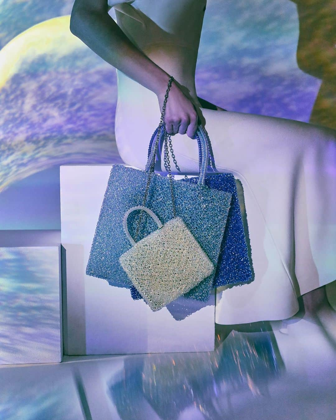 ANTEPRIMAのインスタグラム：「Enchanting Hope.  Hope, lead me to the happiest future. Stella, brighten my life with fascinating sparkles.  Shop the WIREBAG in Stella hues now.  #STELLA #SpringSummer2023 #SS23 #ANTEPRIMA #WIREBAG #SummerBag #BeachBag #PoolBag #WaterResistenceBag #Miniature #MicroBag #MiniBag #CraftBag #CrochetBag #Handcraft #KnitBag #WorkBag #ItalianDesign #Craftmanship #アンテプリマ #Tanabata #七夕 #彦星 #織姫 #牛郎 #織女」