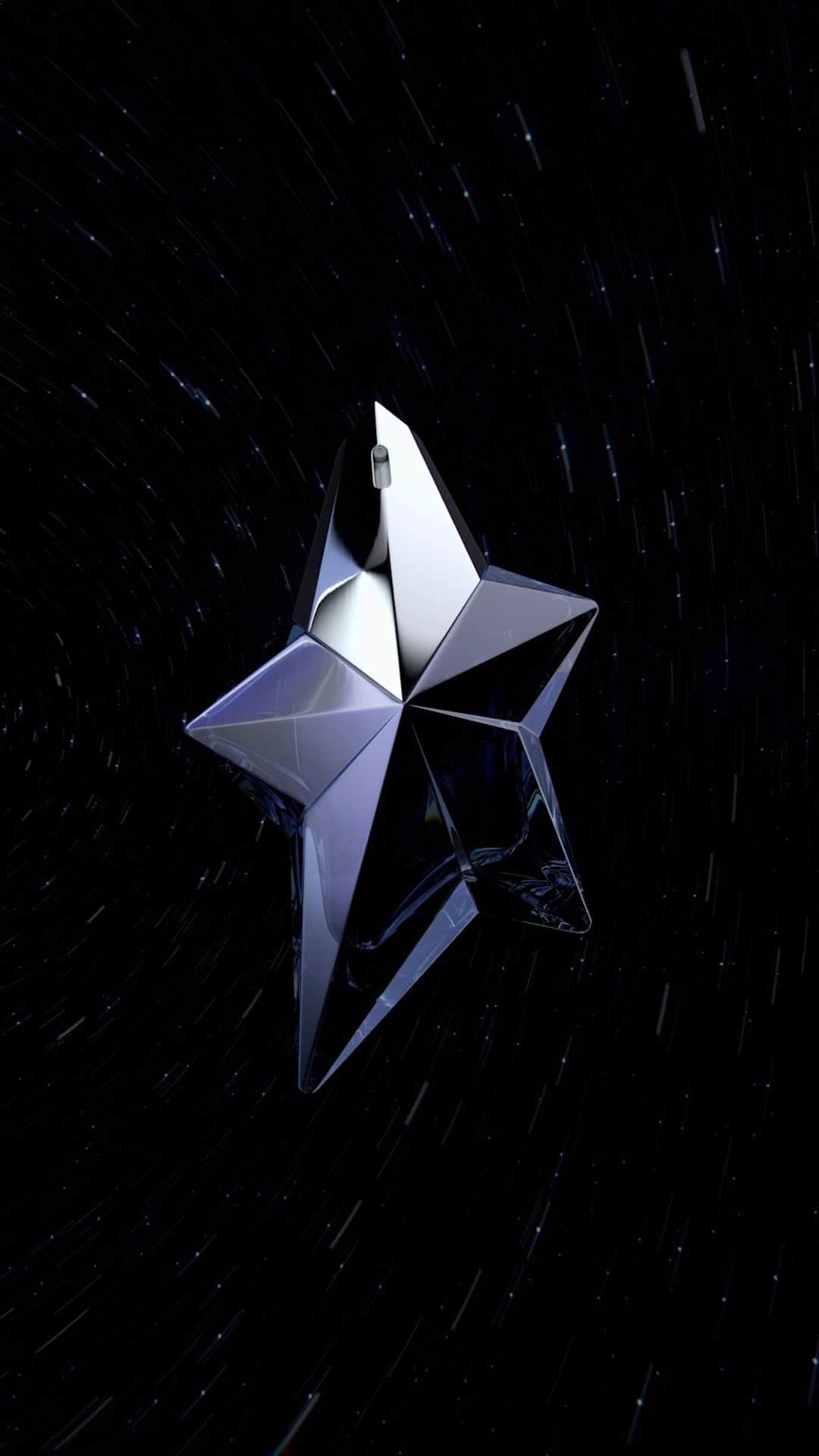 ミュグレーのインスタグラム：「Spinning round and round, the latest Mugler star makes everything move out of its way.  #mugler #angelelixir #newfragrance」