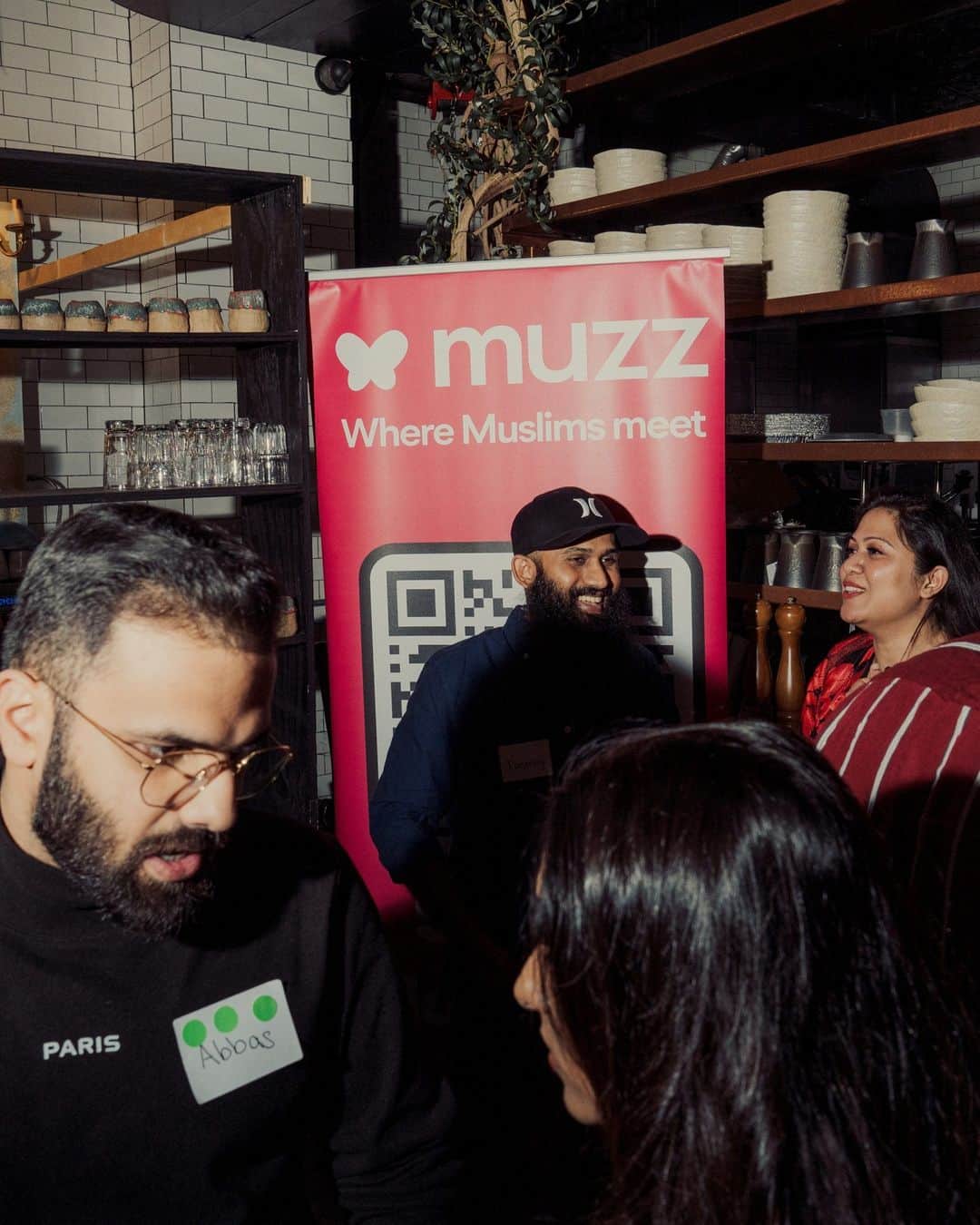 New York Times Fashionさんのインスタグラム写真 - (New York Times FashionInstagram)「On a Thursday evening, about 250 Muslims gathered in a halal Italian restaurant in Brooklyn for a singles dating event hosted by Muzz, a Muslim dating app that assists young Muslims in finding “the one.” ‌Topics of conversation included halal Thai food in New York (“Top Thai — we should go check it out,” one person said to another) and the difficulty of meeting new people while working remotely.  Muzz was founded in 2011 by Shahzad Younas and has eight million users worldwide, according to the company. “The heart of the app is empowering young Muslims to find a partner in their own right, but doing it in a way that respects their faith, culture, traditions and family,” Younas told The New York Times. He aims to “embrace the quirks around Muslim marriage,” he said, which includes a “sweet spot” of familial involvement.  At 7:30 p.m., Younas stood on top of a table in a corner and made a welcome announcement. Women had received a sheet of eight green stickers, and men had received a sheet of eight red stickers. To help make it easier for people to introduce themselves to others, he said, the stickers must be exchanged with people after a conversation — everyone’s goal is “to meet the one,” he said, adding “inshallah,” or God willing.  Some people came to meet other people of a similar faith and cultural background. Ali Fall, a 34-year-old financial consultant, said he had always dated non-Muslims, and his exes didn’t understand his religious beliefs and obligations. Coming into the event, he had no expectations. “I believe in destiny, everything is written,” Fall, who lives in Harlem, said.  Tap the link in our bio to read the full story by @sadibahasan. Photos by @amirbangs」6月6日 3時41分 - nytstyle