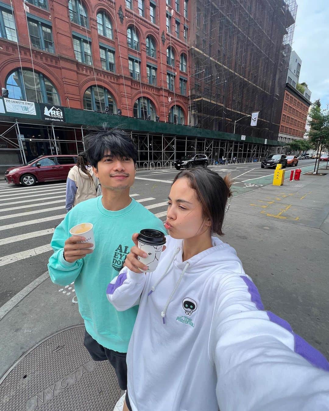 ミーガン・ヤングのインスタグラム：「All we had was 1 hour. We rushed to the coffee shop which opened at 8am. It was only three stops away but Fofo somehow convinced me to grab some coffee so that I could relax before the busy day ahead. I don't know how he thought rushing would be relaxing - but he was right. The moment I took a sip, I forgot about the jetlag and immediately melted into my seat and fell in love with my cup of coffee. Thank you @mikaeldaez for accompanying me on this trip and helping me out with the little things 😍☕️✨ I had so much fun shopping and exploring with you hehe #kiligme」