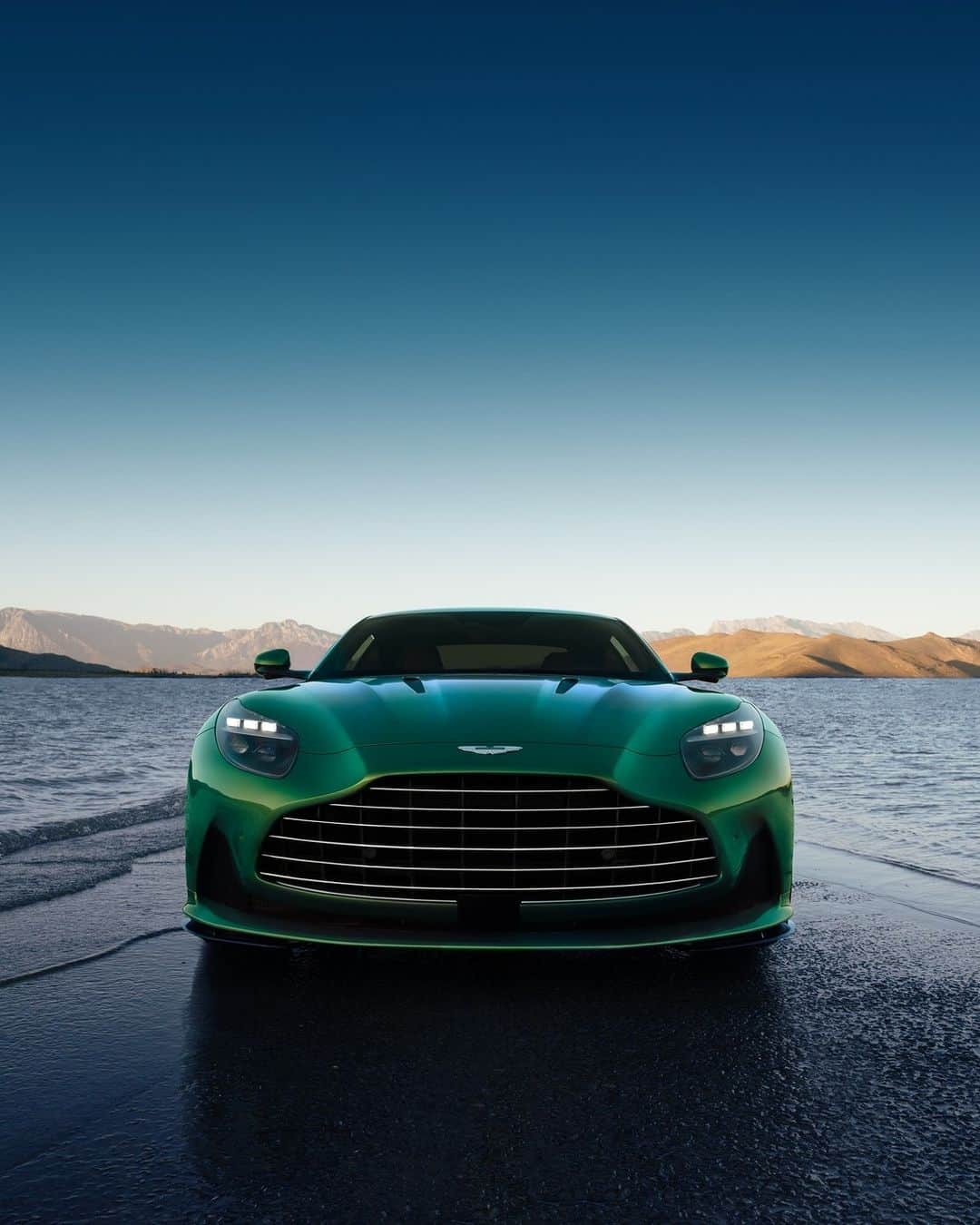 アストンマーチンのインスタグラム：「An aggressive elegance. An unapologetic presence. Perfection that is DB12.   #AstonMartin #DB12 #ICONDRIVEN」