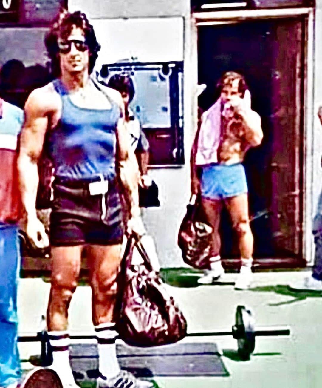 シルヴェスター・スタローンのインスタグラム：「A nostalgic throwback from GOLD’S GYM to when I was training for Rambo 3 with the great Franco Colombu who is standing in the background. The good old days.」