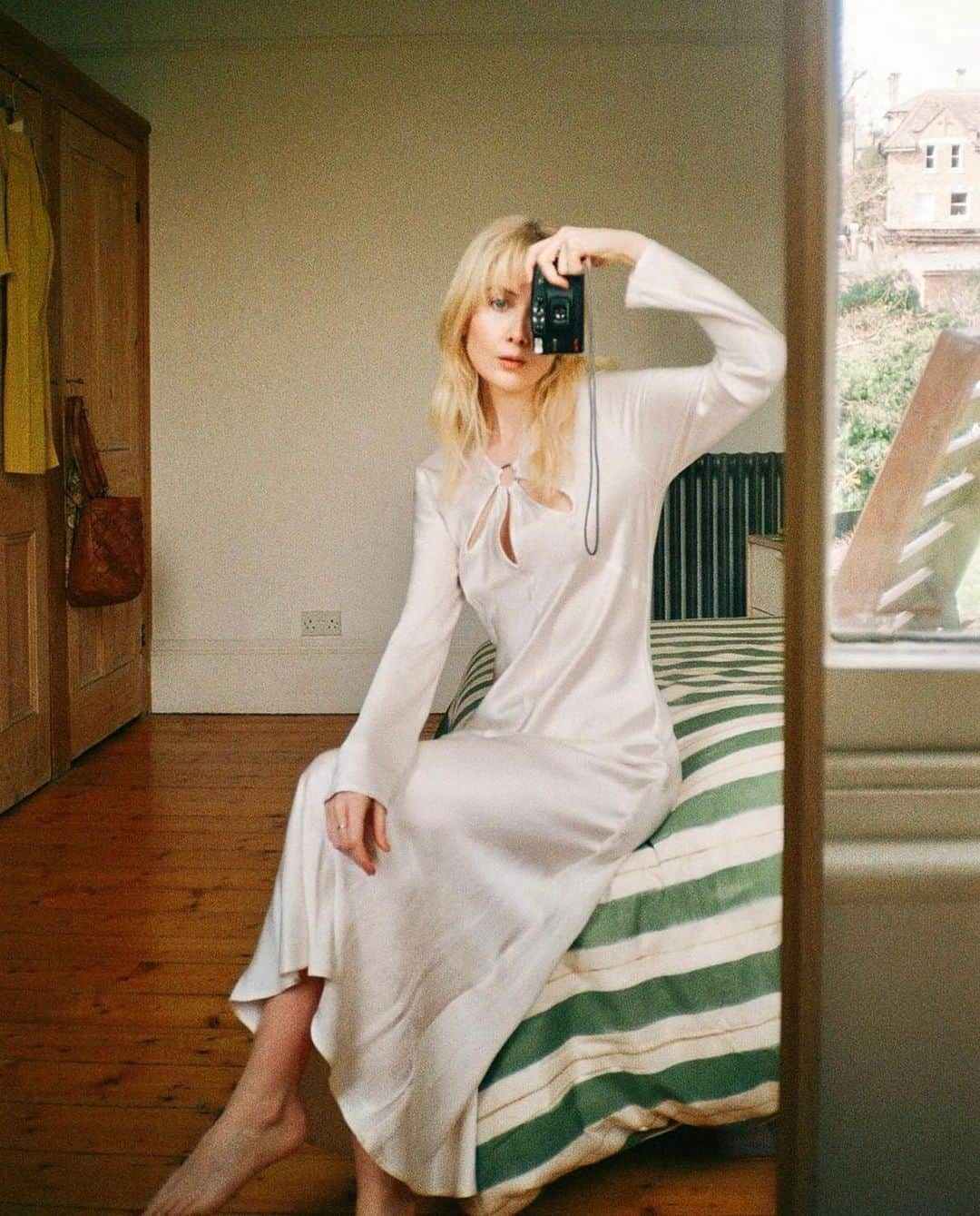 ゴーストのインスタグラム：「@chloekathbutler looking beautiful in the ivory Freya - a timeless midi dress wearable through all seasons 🤍」