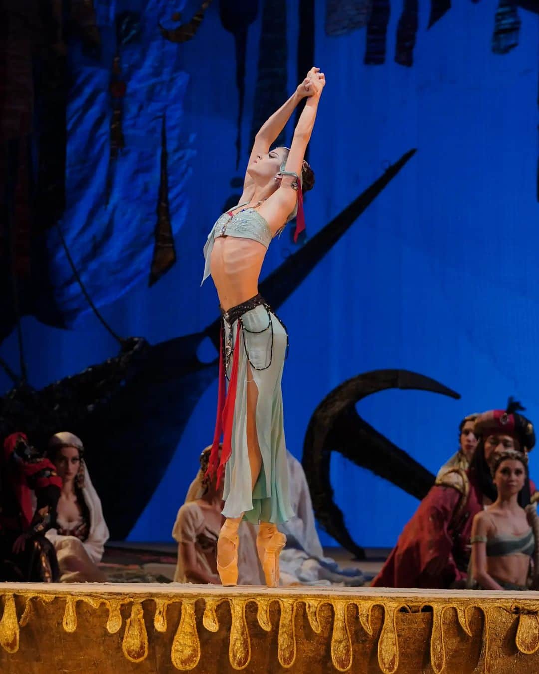 マリア・コーレワのインスタグラム：「Free and independent women of Greece 💪🏻 Medora doesn't accept being a slave, even though she's surrounded by traffickers she's showing her inner strength 🙏🏻 Photos from our recent "Corsaire" 07.06.23 by @anfffoto 🤩 Amazing Lankedem @_aleksei_timofeev   Свободные и независимые женщины Греции 💪🏻 Медора не приемлет участь рабыни и несмотря на то, что она окружена торговцами людьми, она все равно не боится показать силу своего характера и выразииь протест 🙏🏻 Фотографии с недавнего "Корсара" 07.06.23 авторства @anfffoto 🤩 Замечательный Ланкедем @_aleksei_timofeev」
