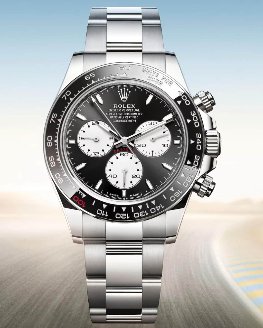 WATCHMANIAのインスタグラム：「Rolex is celebrating the 100th anniversary of the 24 Hours of Le Mans race with an original version of its legendary chronograph. Crafted in 18 kt white gold, this new watch sports a Cerachrom bezel in black ceramic; on the tachymetric scale, the number ‘100’ in red ceramic evokes the race’s centenary. $ 51,400」