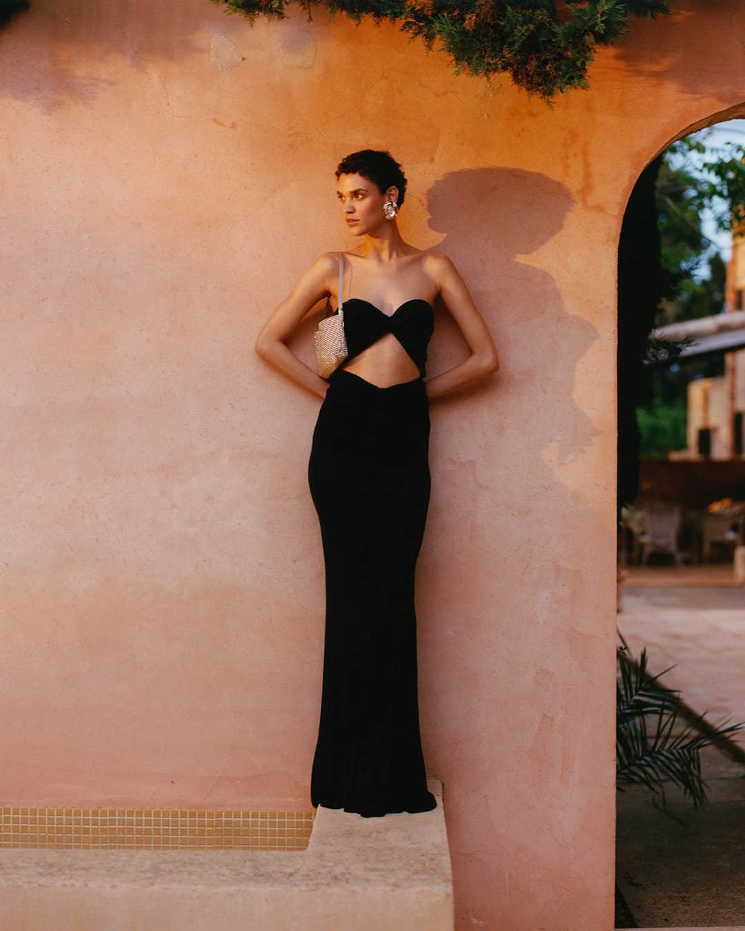 ネッタポルテのインスタグラム：「BACK TO BLACK: A picture of modern glamour and effortless Parisian sensibility, steal the show in @ysl's ultra-chic maxi dress.  Tap the link in bio to shop at #NETAPORTER.」