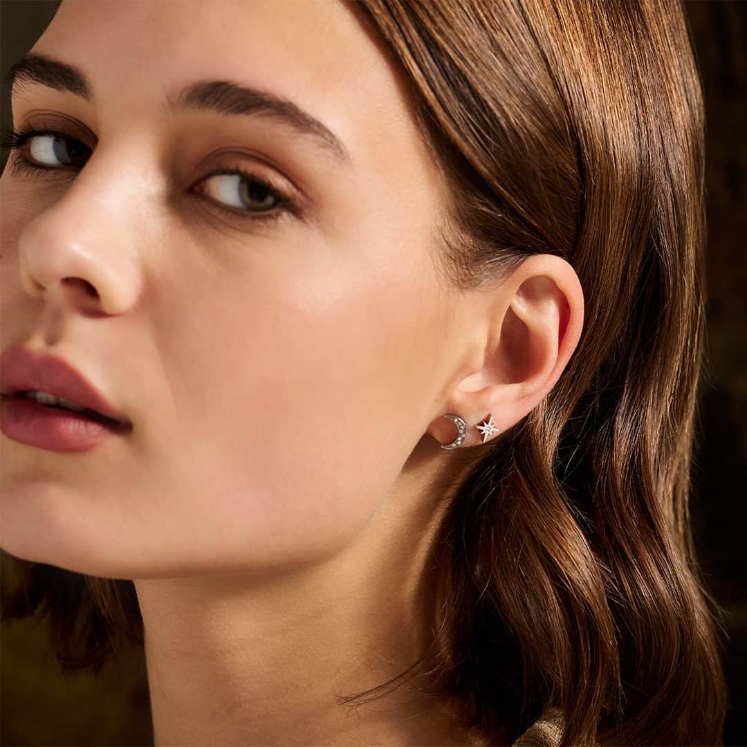 Olivia Burtonのインスタグラム：「Mix, match and stack with the North Star & Moon Gold Stud Earrings Set. ⭐️🌙  Tap to shop.」