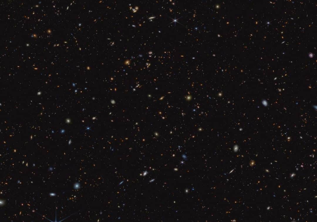 NASAさんのインスタグラム写真 - (NASAInstagram)「Where did we all begin? What were the first stars and the galaxies like?   @NASAWebb is looking for answers.  Researchers using Webb data identified more than 700 galaxies that existed when the universe was much younger, just 370 million to 650 million years old.  Image Description:  Thousands of small galaxies are scattered on a black background. Some are noticeably spirals, either face-on or edge-on, while others are blobby ellipticals. Many are too small to discern any structure. A few spirals are bluish, but most of the galaxies appear yellow or red. A handful of stars display eight-point diffraction spikes.」6月12日 2時07分 - nasagoddard