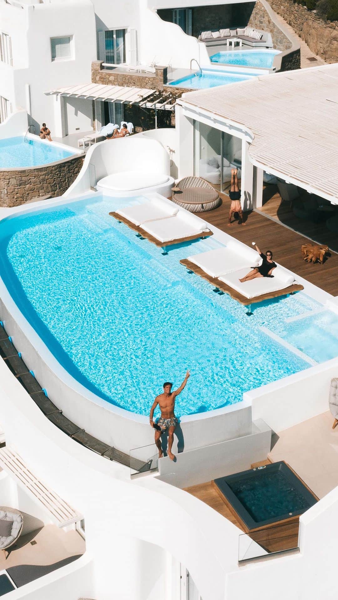 bestvacationsのインスタグラム：「Tag who you’d jump with! Jumping into @cavotagoomykonos 🇬🇷 . 🎥 @morten.benestad of @melissa inspired by @elona」