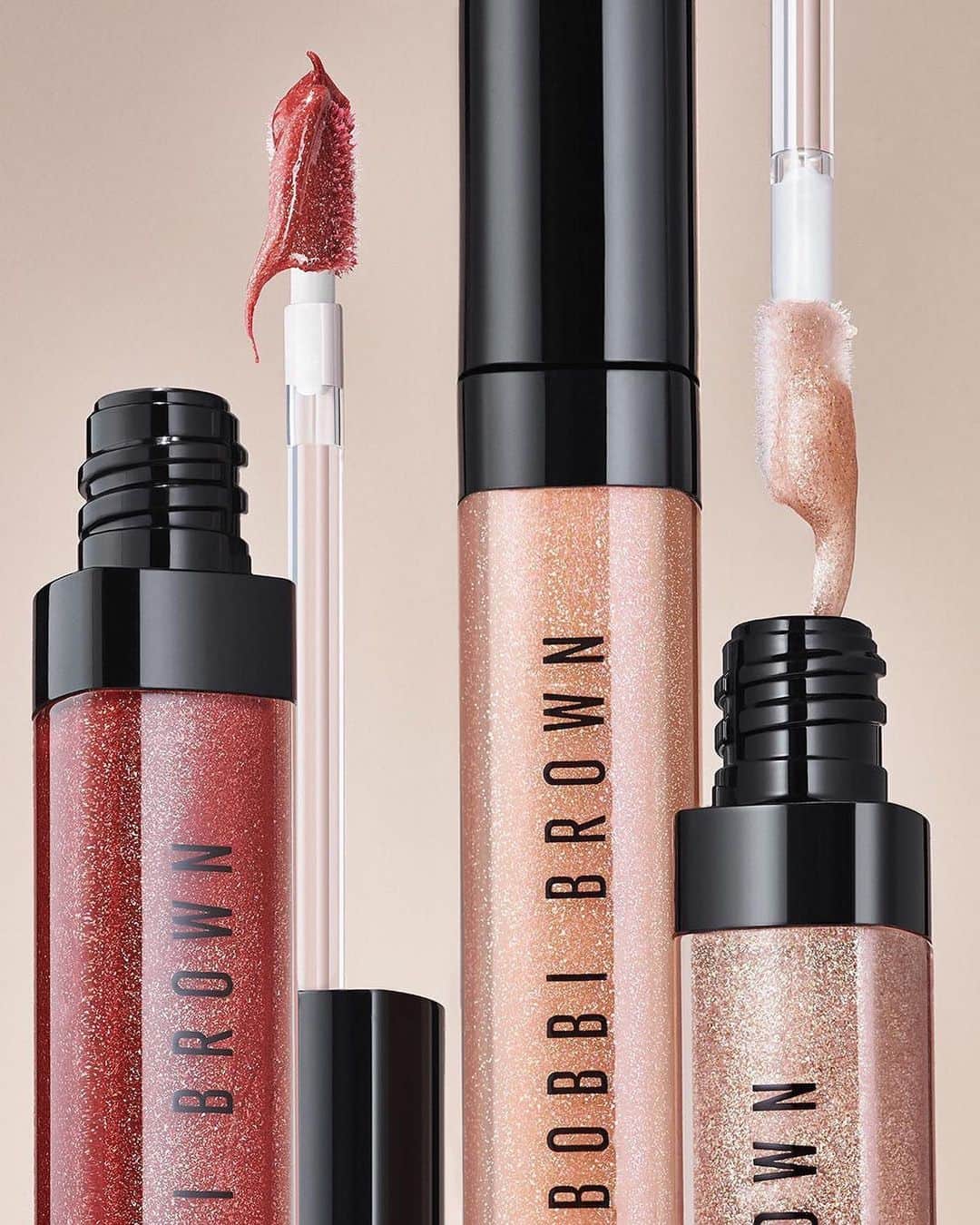 のインスタグラム：「Spark something. Swipe on our nutrient-rich Crushed Oil-Infused Gloss Shimmer to add a sparkling (never sticky) finish to any look.  SHIMMER ON: •Kir Sugar  •Bellini  •Bare Sparkle  #BobbiBrown #CrushedLip #SummerMakeup」