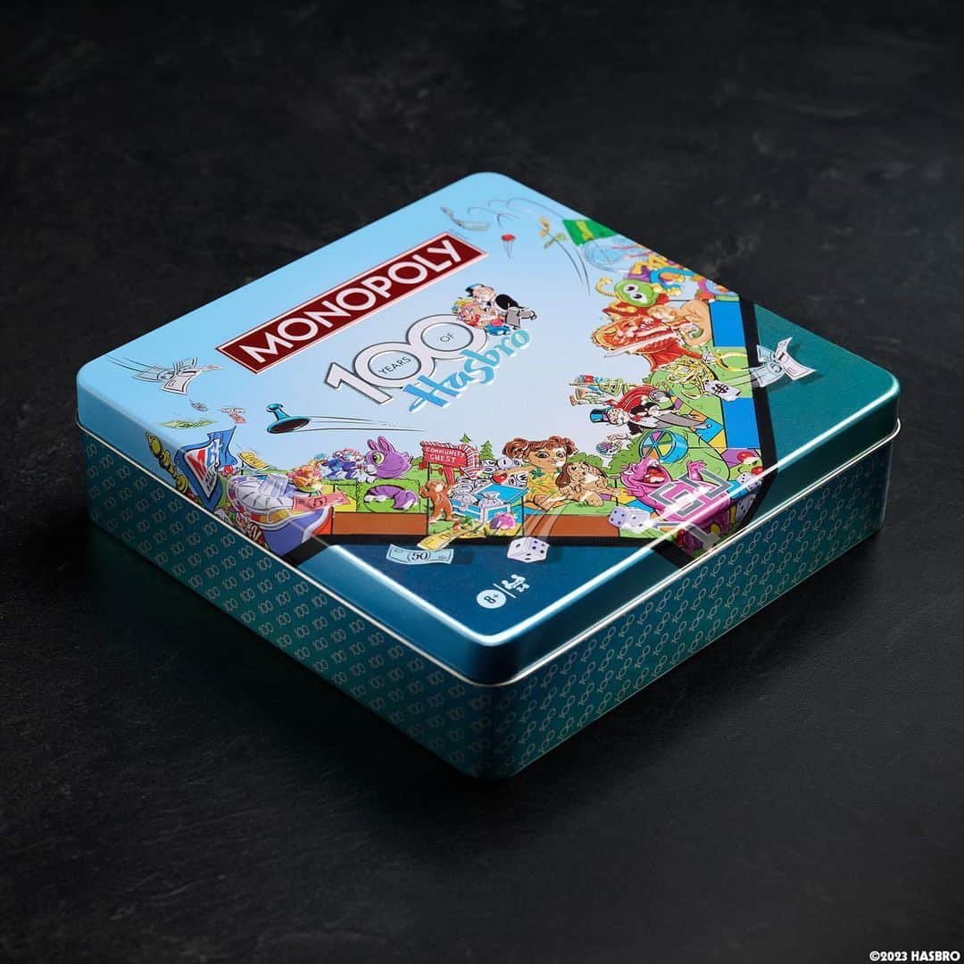 Hasbroのインスタグラム：「🎉 Celebrate Hasbro's 100-year legacy with a limited edition Monopoly created by WS Game Company! Check out the custom illustrated game board that commemorates the anniversary by highlighting 90 of Hasbro's most acclaimed brands including Transformers, Peppa Pig, Magic: The Gathering, My Little Pony, Nerf and so many more.   This premium game comes encapsulated in an embossed unique collectible tin box and features Hasbro's iconic fun-loving characters at every corner of the board, components, and packaging. #hasbro100」