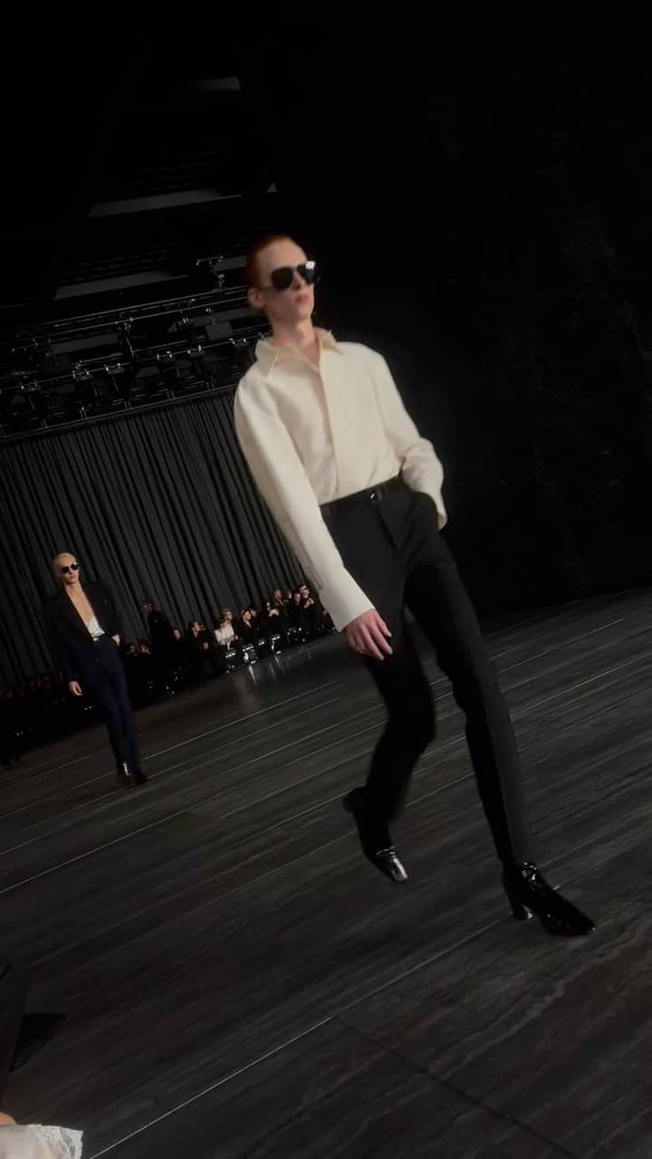 AnOther Magazineのインスタグラム：「At Berlin’s Neue Nationalgalerie, @ysl unveils its new S/S24 men’s collection 🖤  Developing the ethos of the recent presentations by @anthonyvaccarello, the new collection considers the interplay of masculine and feminine, while remaining sharp with its key – and now signature – exaggerated shoulder silhouette, expanding the dialect for the ever-evolving Saint Laurent wardrobe.   🎥 by @alexanderfury」