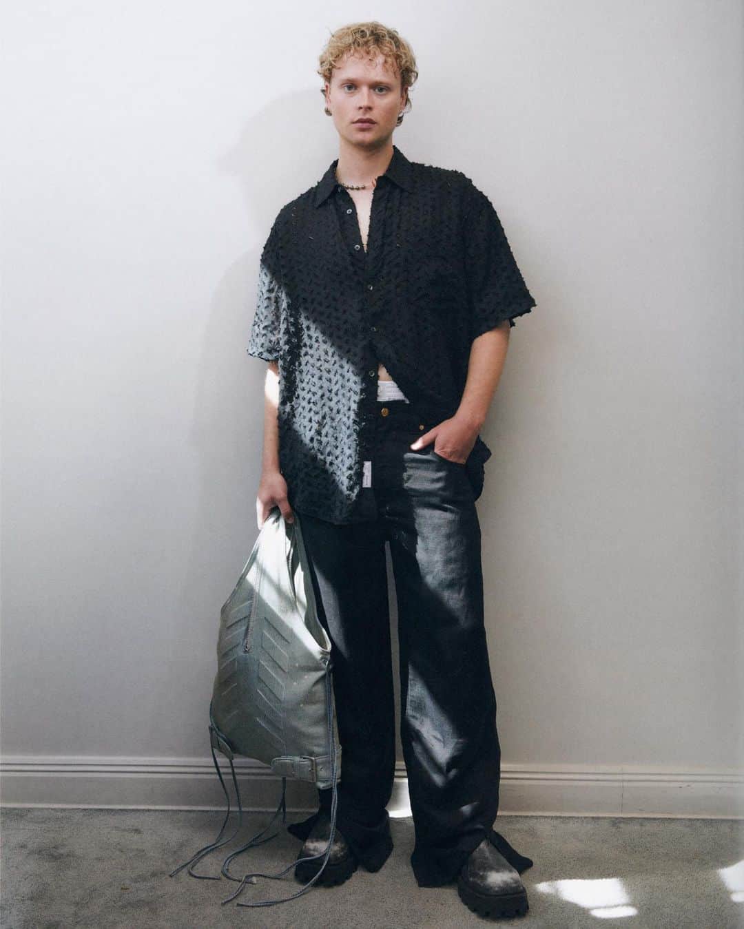 エイティーズのインスタグラム：「An ode to both home and away, friends of EYTYS were shot in Stockholm for the Spring/Summer 2024 collection, embodying the sun-lit rays of an Amalfi coast adventure.  Edvin wears look 18.」