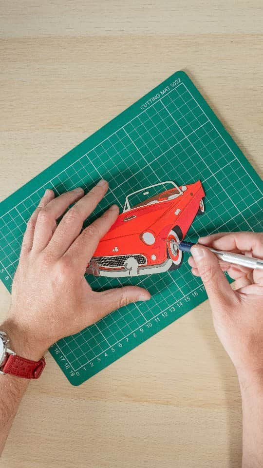 Rich McCorのインスタグラム：「#Ad | I revved up my paper craft skills to celebrate @breitling_uk's latest addition to its racing team - the #TopTime Ford Thunderbird. It's one of four models in the retro-inspired Top Time collection, complete with a red racing-style leather strap and rounded sub dials in a layout reminiscent of dashboard instruments. Each watch in the collection brings elements of various American muscle cars into its design, and recently a beautiful bright red Thunderbird was parked outside the Breitling Boutique & Cafè in Battersea Power Station. Beautiful Cars, Beautiful Watches and Beautiful Coffees - what a dream.」