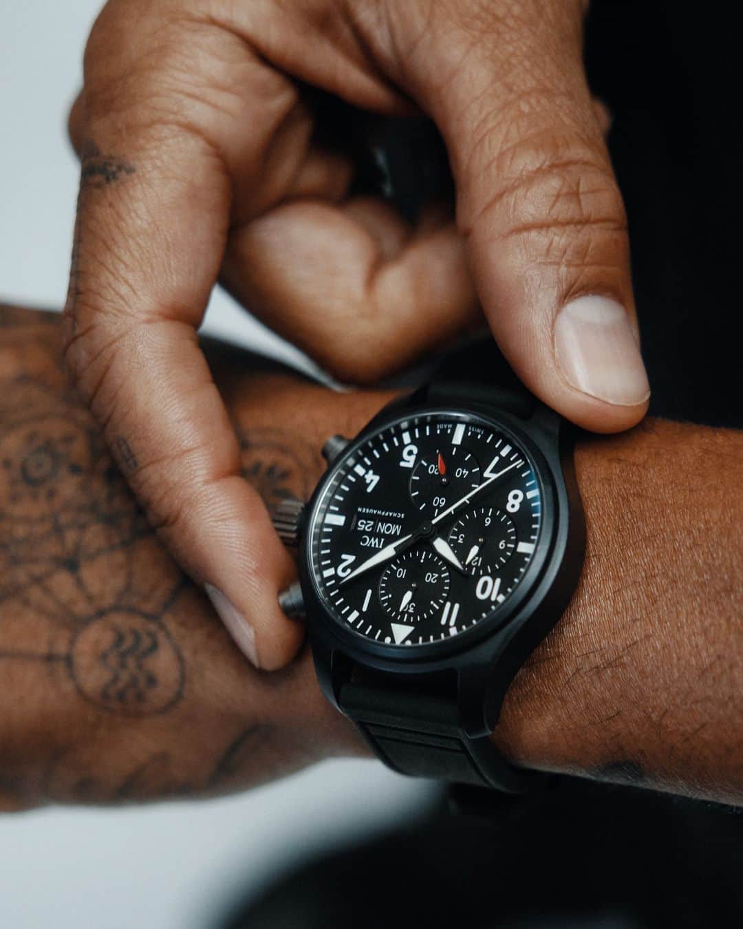 IWCのインスタグラム：「When seconds count, precisions matters. By expertly combining precise functionality with a modern design like in our #IWCpilot Chronograph 41 TOP GUN (Ref. IW389401) worn by @lewishamilton. #TheReference   🔗Link in Bio」