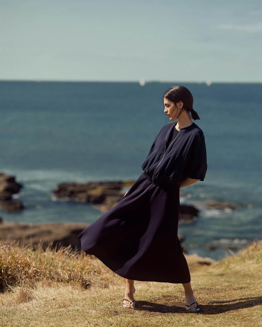 Theory luxe official account.のインスタグラム：「［LOOK BOOK SUMMER 2023 -JUNE - JULY  BLOUSON：Flow Danila DRESS：Suffork Diva  #theoryluxe #セオリーリュクス #ワンピース #ニットワンピース #ニットワンピ #リゾートスタイル #リゾートコーデ #サマードレス #ブルゾン #ワントーン #ワントーンコーデ」