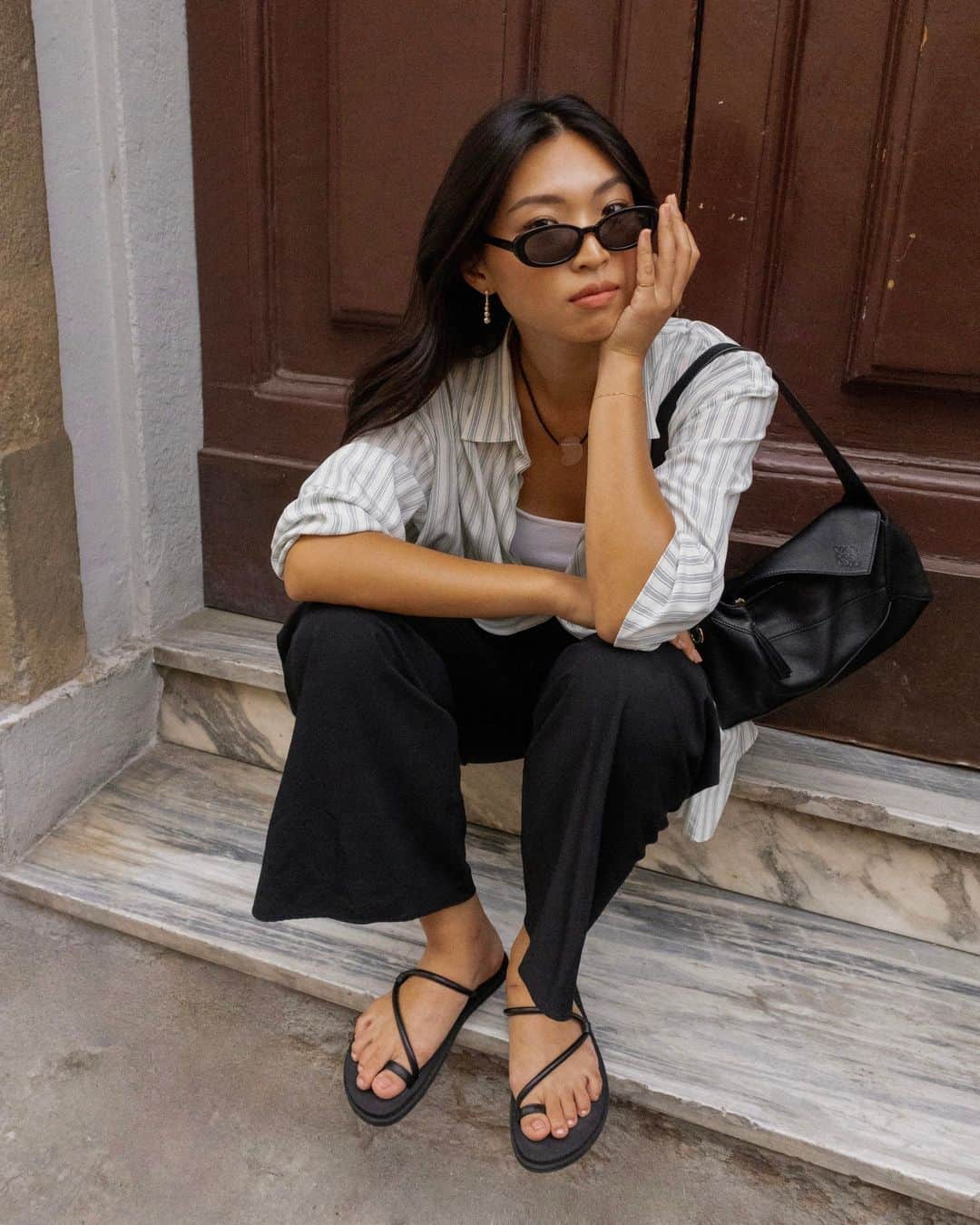 ネッタポルテのインスタグラム：「BEST FOOT FORWARD: Take on summer in the city in style like @michellelin.lin in @emmeparsons' easy-chic sandals. #THENETWORK  Tap the link in bio to shop at #NETAPORTER.」
