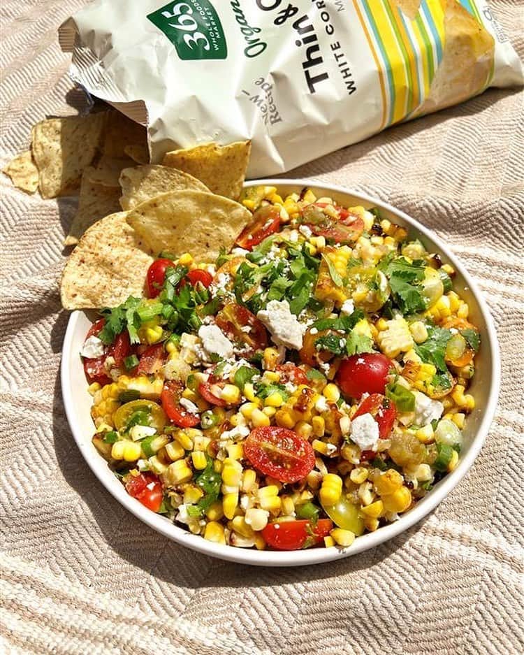Whole Foods Marketのインスタグラム：「Grilled 🌽 salad bursting with organic cherry tomatoes, fresh cilantro and crumbled feta cheese.」