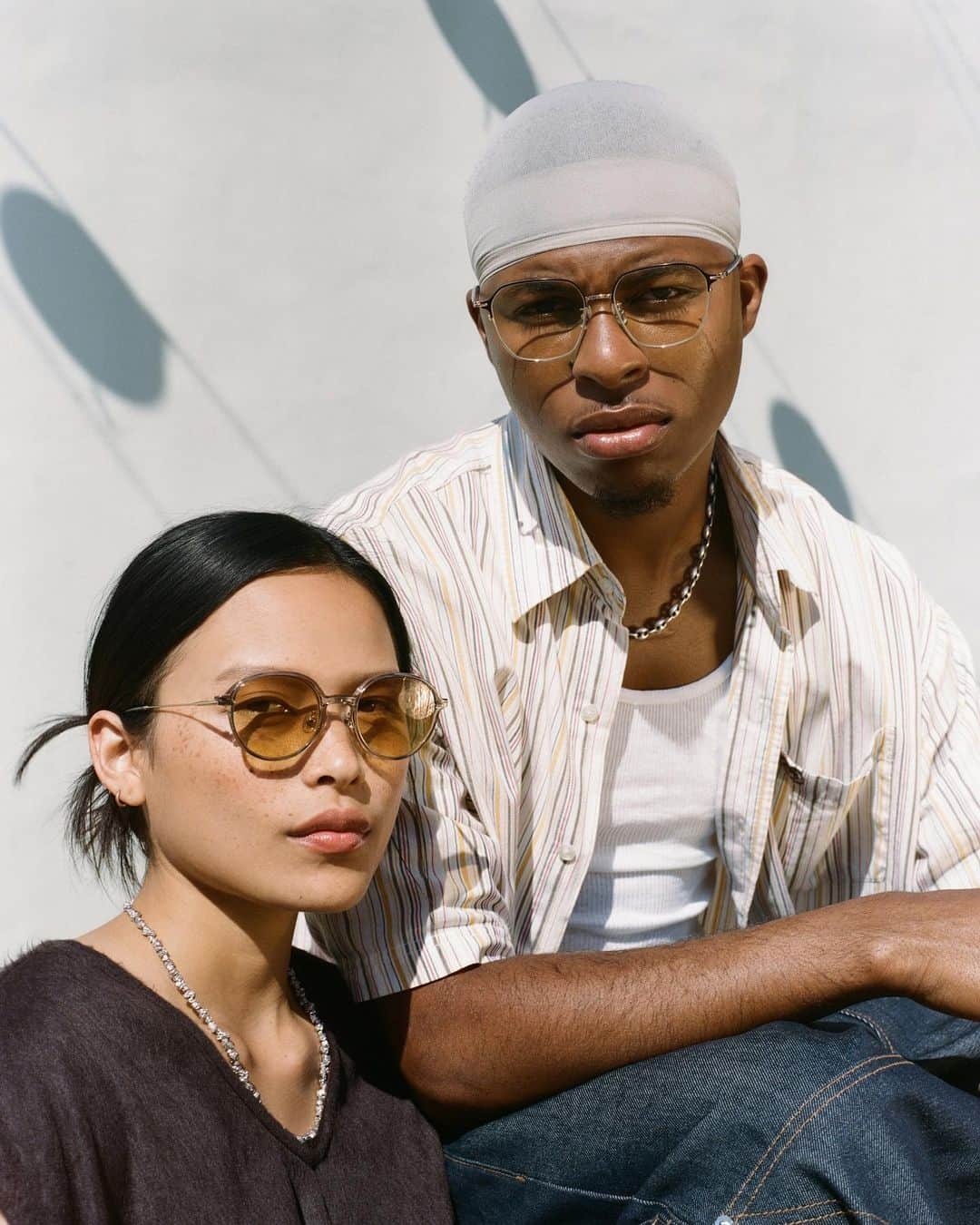 JINSのインスタグラム：「JINS Summer 23 styles. Shop seasonal metal, tortoise, Airframe, and Made in Japan frames. Shot on location in Chinatown, Los Angeles.   Photographer: @michaeltyronedelaney Stylist: @hoodbyblood HMU: @carlacsperez Talent: @malymannn @j0rdanjohns0n  Production: @authorized____dealer」