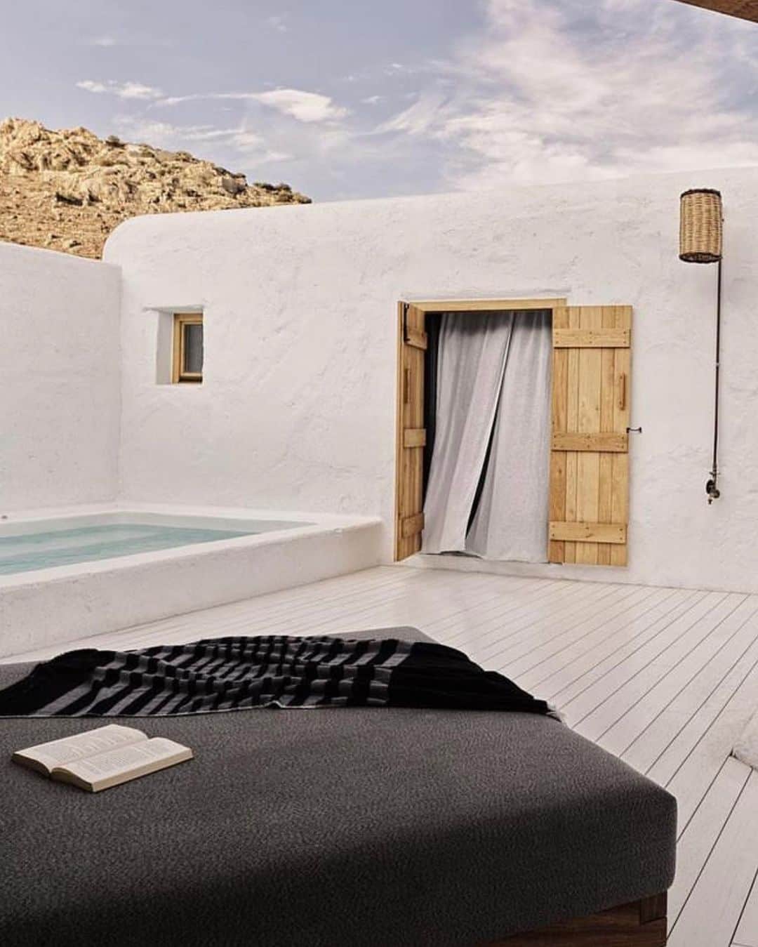 The Cool Hunterさんのインスタグラム写真 - (The Cool HunterInstagram)「Here are some previews of  @nomad_mykonos where the breeze of the Aegean sea, the warmth of the sun, and the beauty of exquisite design set the stage for a truly relaxing holiday.  We love the feel of isolation and calm that are so complete at @nomad_mykonos No need to go anywhere at all, not even to the gorgeous Elia beach, as the 14 luxury villas are so perfectly appointed with their own pools and expertly served that one hardly ever needs to leave the villa.   Except to relax by the pool or enjoy the best Greek breakfasts and lunches or dinners that are sometimes prepared and enjoyed by the outdoor fireplace. A car is recommended as a Nomad is a 20 minute drive into town. Bohemian luxury as it’s best. #swipeleft」6月16日 14時25分 - thecoolhunter_