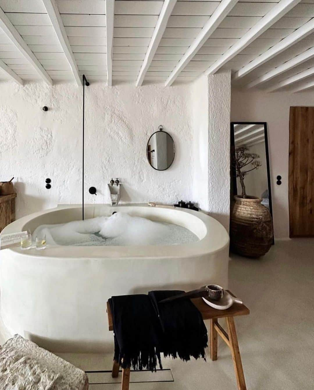 The Cool Hunterさんのインスタグラム写真 - (The Cool HunterInstagram)「Here are some previews of  @nomad_mykonos where the breeze of the Aegean sea, the warmth of the sun, and the beauty of exquisite design set the stage for a truly relaxing holiday.  We love the feel of isolation and calm that are so complete at @nomad_mykonos No need to go anywhere at all, not even to the gorgeous Elia beach, as the 14 luxury villas are so perfectly appointed with their own pools and expertly served that one hardly ever needs to leave the villa.   Except to relax by the pool or enjoy the best Greek breakfasts and lunches or dinners that are sometimes prepared and enjoyed by the outdoor fireplace. A car is recommended as a Nomad is a 20 minute drive into town. Bohemian luxury as it’s best. #swipeleft」6月16日 14時25分 - thecoolhunter_