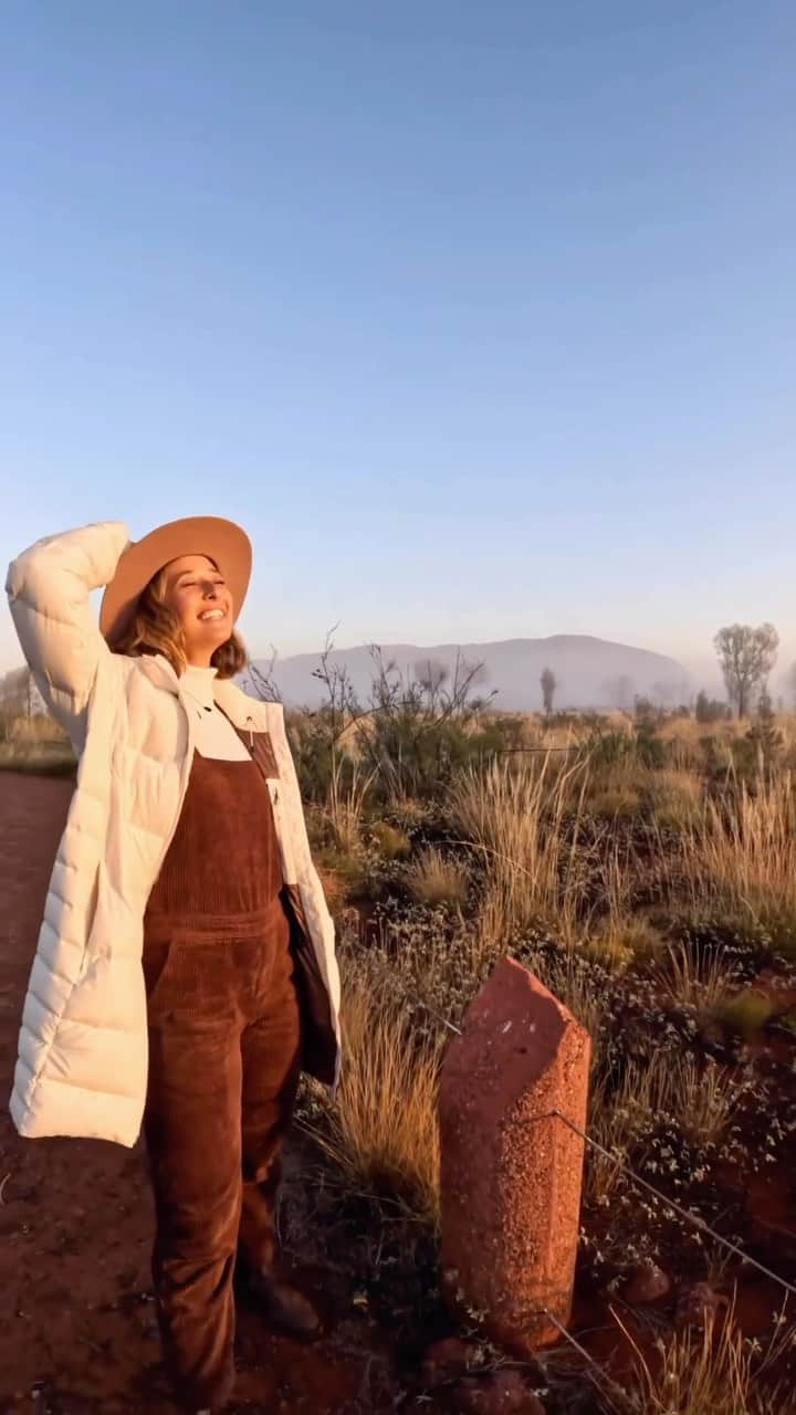 Australiaのインスタグラム：「Mornings just hit different in the ❤️ of #Australia ✨Time to pick your favourite playlist and hit the road to explore the wild beauty of @ntaustralia. Destination? @seeuluru, obviously! Nestled within the World Heritage-listed #UluṟuKataTjuṯaNationalPark, we recommend discovering the region’s local culture with @seitoutbackaustralia or @marukuart, before spending your evening under @visitcentralaus stars and savouring Aussie #bushtucker at @exploreuluru’s #SoundsofSilence. Tag a mate you’d bring along 👇   🎥: @teigannash   📍: Uluṟu Kata Tjuṯa National Park, @visitcentralaus, @ntaustralia - home to the Aṉangu people.   #seeaustralia #comeandsaygday #ntaustralia #redcentrent #visitcentralaus」