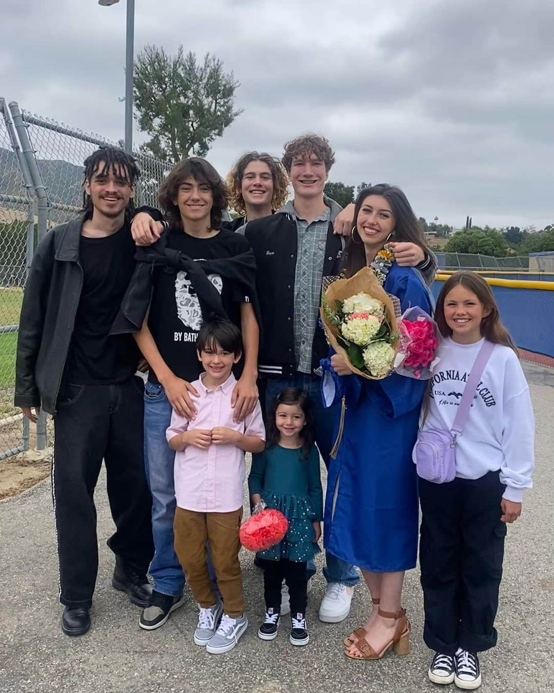 カンディー・ジョンソンさんのインスタグラム写真 - (カンディー・ジョンソンInstagram)「This post took me all day & several tears to make😭:  1. I can’t believe my Alani has graduated high school🥹 (i had cried off about 60% of my eye makeup & mascara this picture)  2. 2011: It feels like yesterday I was holding her as a precious, blue eyed baby. Tears filled my eyes today looking at her adorable little face, in her kindergarten graduation cap and her tiny hand, holding her little paper “diploma” scroll🥹  3 & 4:  Fast forward what feels like a few blinks of my eyes and years disappeared into senior photos and high school graduation photos😭🥹🎓  5. This was my first cry of the day: watching my beautiful, young woman, gracefully walk with confidence in her cap & gown…as if time sped up and my heart still wanted to rewind time and hold onto her being little, a little while longer❤️  6. We all tried to be the family that cheered, hollered, whistled and yelled the loudest…especially since I didn’t end up ordering the cowbells I thought would be fun and the family next to us with the air horn did make me wish I bought some.  7. Afterwards when I hugged her…my heart just sprang a love-leak I couldn’t stop crying and holding onto my baby girl who graduated❤️  8. Alani with all her siblings & cousins ❤️ who all cheered the loudest!  9. With her Nonni & Nana - in a complete “grandma sandwich” of love ❤️   10. Alani & her sweet boyfriend, Jadyn - who wins for best “vintage tuxedo t-shirt” award also!   To my Alani…(oh no, I’m crying again😭🥹😂)… My first baby girl, you’re my heaven-made-best-friend (I know people say you can’t be friends with your kids but I think you can be their parent and they can be your best friend too❤️) since before I even saw your face.  You are filled with so much creativity, from writing that’s brought me to tears and in awe of your talent, to your works of art that have amazed me. Everything you touch and do, is turned into art. Even though you love punk music and playing the bass, your tender, kind and caring heart will always be the music that your heart plays for the world.  You will do great and creative things my beautiful girl❤️And I’ll always cheer you on! I love you forever & always, your biggest fan for life, Mama❤️」6月17日 16時07分 - kandeejohnson