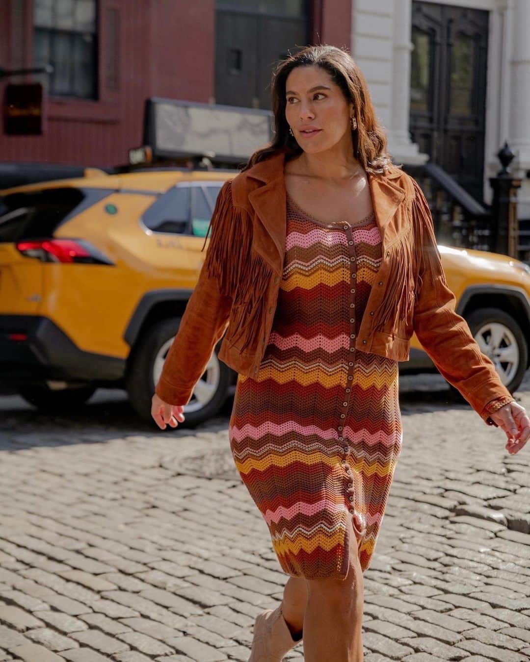 SPELLのインスタグラム：「Tonal heaven with @jessicavanderleahy in our iconic Rider Suede Tassel Jacket + our organic cotton Ziggy Crochet Midi Dress in NYC 🌟」