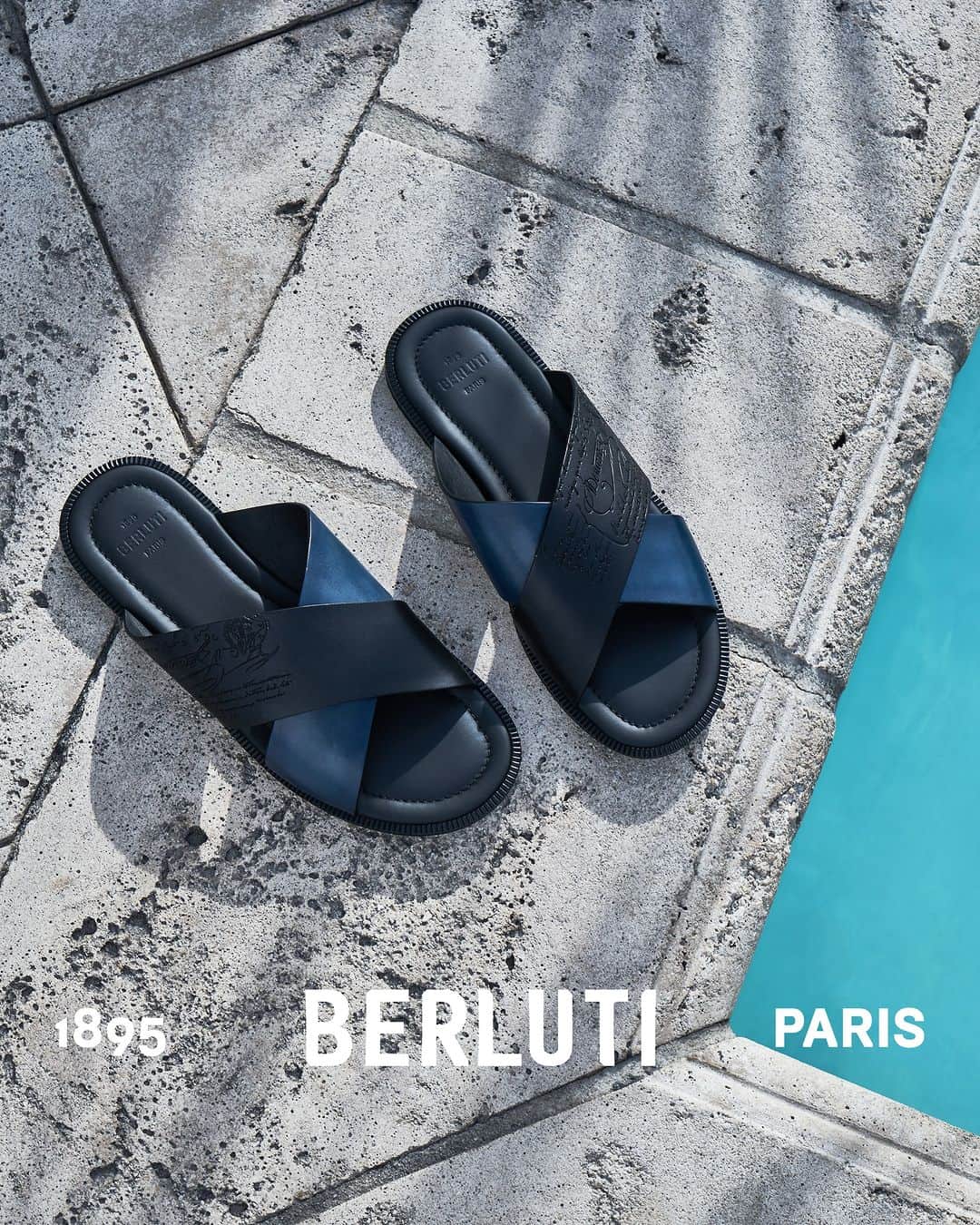 ベルルッティのインスタグラム：「- THE SILHOUETTE: SUMMER 2023 BY #BERLUTI -   Elevate your holiday look with Berluti’s seaside essentials by pairing cyanotype-printed swimming shorts with the new Sifnos sandals in Aveiro-patinated Venezia leather. Add a terrycloth bucket hat to complete the outfit.   Now available online and in-store.   Photography by @chauntevaughn」