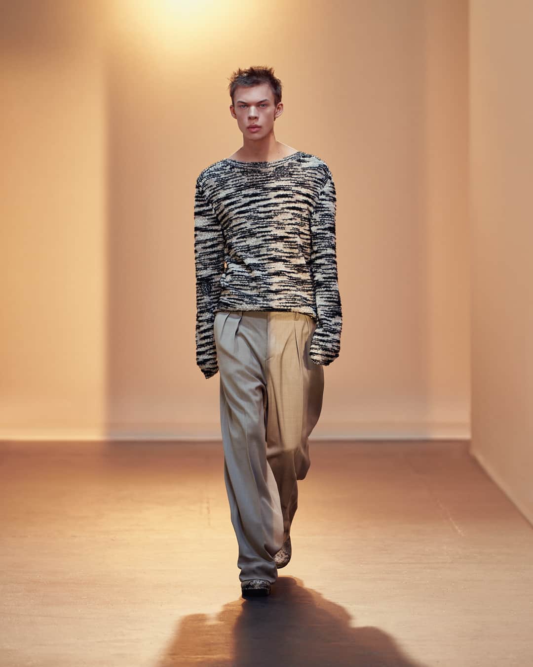 フィリッパコーのインスタグラム：「To celebrate Filippa K's 30th anniversary, the Spring/Summer 2024 collection borrows from archival fabrics, silhouettes and details. Styles include pleated trousers, a relaxed knitted vest in certified lambswool, bootcut trousers in camel, and a sheer slim tank in beige.  Photographed by @timothyschaumburg Styled by @ondineazoulay Make-up by @_georginagraham_ Hair by @ramoneyluv Set design by @florinemilie Models: @antematz, @chunjincj, Tim Prause, @malloryveith  #FilippaK #FilippaKSS24」