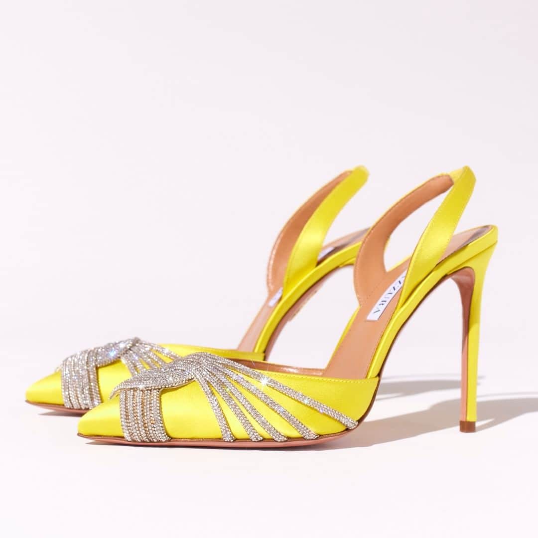 Aquazzuraのインスタグラム：「Slingbacks, reimagined. Meet Gatsby Sling, our silky showstopper in electric yellow with a splash of dazzling crystals   #AQUAZZURA  #AQUAZZURAPumps」