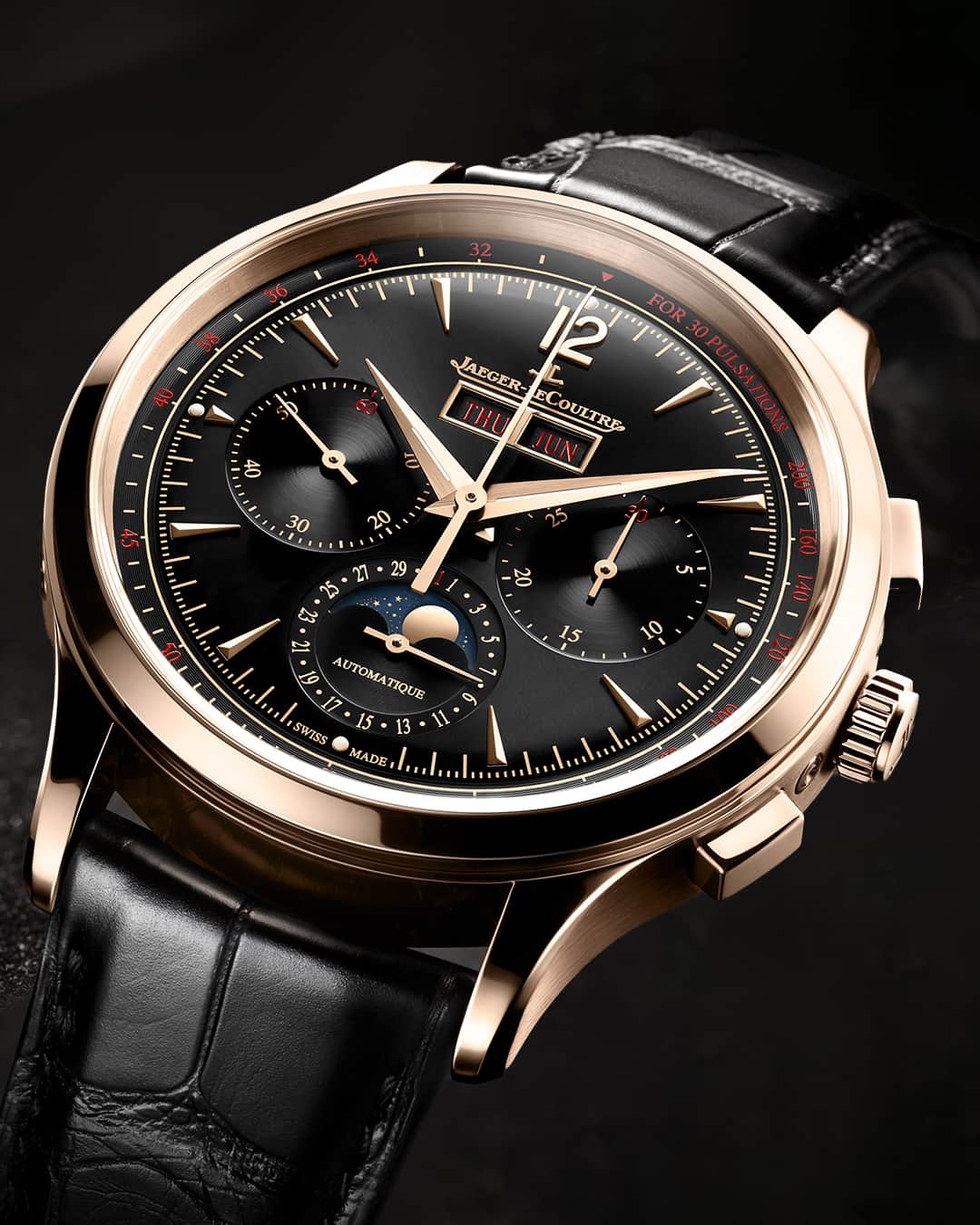 ジャガールクルトのインスタグラム：「Master Control with vintage appeal. #Master  _ Master Control Chronograph Calendar Designed, made and assembled in our Manufacture _ The dial is framed by a pulsometric scale marked around the flange which, in keeping with tradition, is marked in red. Creating a dynamic contrast with the black dial, the red is repeated on each of the three sub-dials and in the day and month windows, drawing the eye to this valuable information. _ #JaegerLeCoultre #Master」