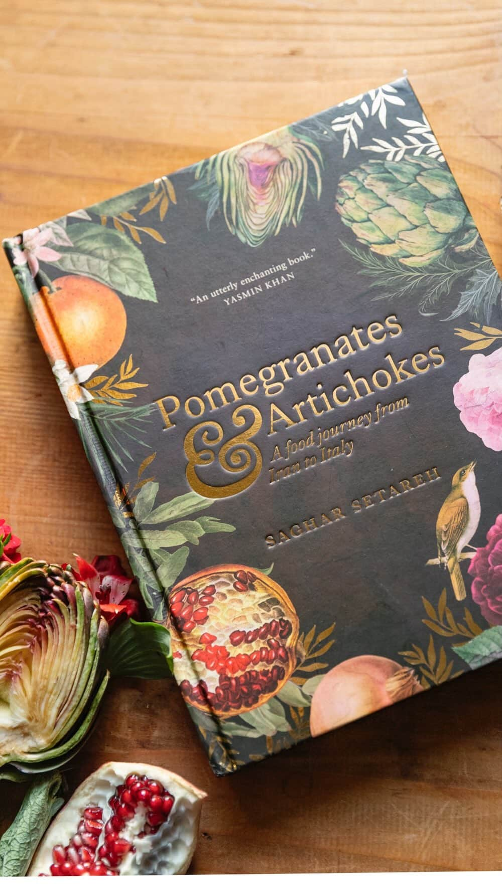 Saghar Setarehのインスタグラム：「IT’S AMERICAN PUBLICATION DAY! 🔊 Pomegranates & Artichokes, a food journey from Iran to Italy is now available in the US and North America, in a mahogany and gold cover. Please turn on the sound to listen to snippets of the main introduction and the begging of each of the three chapters: Iran, In Between, Italy.   I’m delighted to share this extracts of this wonderful review on @publisherswkly: “At the age of 22, Iranian-born Setareh moved to Rome and fell in love with Italian food, leading to an interest in the cuisine of her own heritage and the culinary impact of migration. The result is this fascinating and deeply personal debut recipe collection, which evinces warm feelings about both locales while also training a clear eye on the experience of being foreign in Italy.   […] Setareh elegantly spins a web of connections between all three [chapters of Iran, In Between and Italy]: showing how golden-crusted Neapolitan rice timbale, Palestinian maqluba, and Iranian rice cake with eggplant (all “triumphs of rice”) share common roots. Fattoush bread salad from Syria resembles Tuscan panzanella, and in the author’s youth she splattered ketchup on Iranian makaroni (spaghetti with a meat sauce tinged with turmeric, cinnamon, and saffron).  […] Gorgeous photography throughout enhances the experience. Setareh’s thoughtful tone and generosity of spirit make this well worth a look.”  You can purchase Pomegranates & Artichokes in the US and North America via link in my bio.  🎥 by my talented friend @tommaso.javidi   Published by @interlinkbooks  Via @murdochbooks _uk  @a.m.heath   #PomegranatesAndArtichokes #cookboo k」