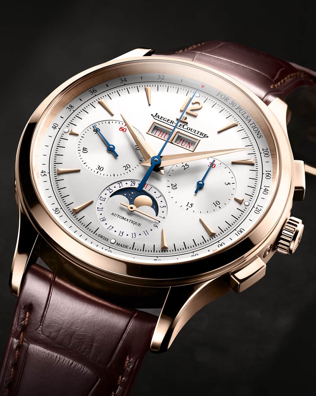 ジャガールクルトのインスタグラム：「A modern elegance.  #Master _ Master Control Chronograph Calendar Designed, made and assembled in our Manufacture _ With a linear timeline that is pure in its chronometric expression, the design incorporates blue chronograph hands and a blue moon phase disc to highlight the complication indications. This watch comes in a dial color-palette that emphasizes refinement. The silver sunray-brushed dial carries a tone-on-tone aesthetic, retaining the essential design codes of the Master Control. _ #JaegerLeCoultre #Master」