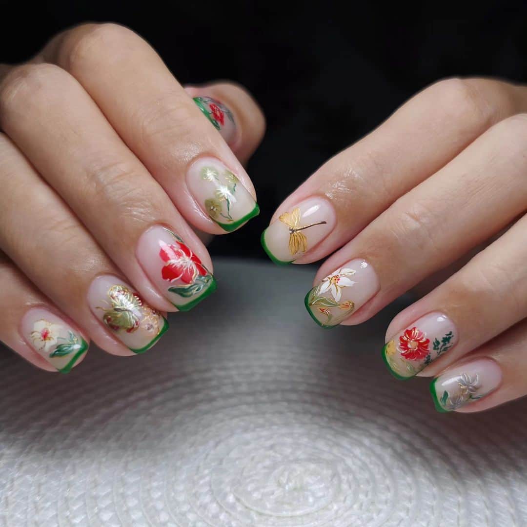Yingのインスタグラム：「Base: Didier Fiber Base Milky Pink Art: PREGEL #285, #870, PREGEL MUSE M1009, PREGEL French White, PREGEL Art Liner Ash Brown, Green, Deep Forest Thin French tips: PREMDOLL MUSE M684 Gold outlines: Kimagure Liquid Metal Gold  Design referenced from @flickanail  SHOP: @nailwonderlandsg www.nailwonderland.com」