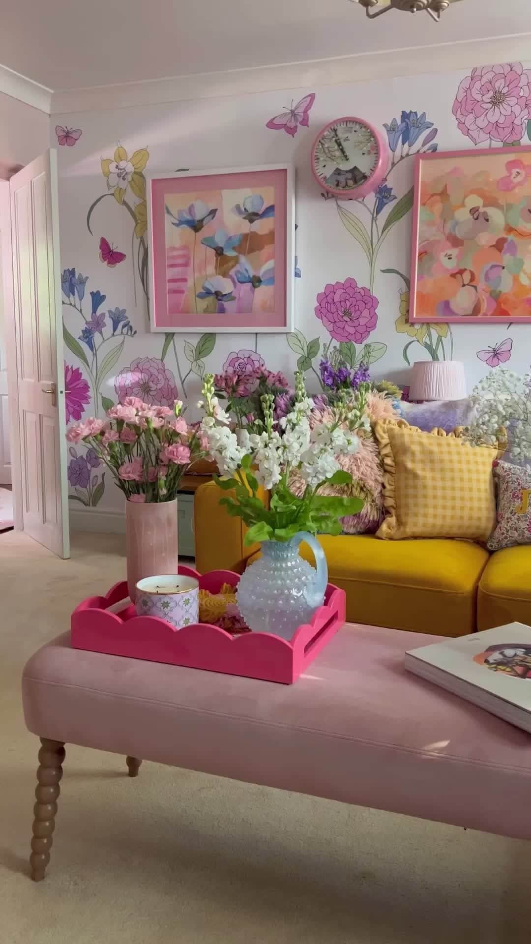 ローラアシュレイのインスタグラム：「Summer has officially arrived in your living room 🌸 @thiscolourfulnest created an inviting, homely atmopshere with the beautiful Gilly Mural and our decorative cusions. ⁣ ⁣ 🔎 Joyful cushion⁣ 🔎 Dijon gingham cushion⁣ 🔎 Hemsley pleated silk lampshade (pink)⁣ 🔎 Lady fern Dijon cushion⁣ 🔎 Velvet blush Rowe bench⁣ 🔎 Maria Table lamp base⁣ 🔎 Picardie Table Lamp Base⁣ 🔎 Helmsley pleated silk Lampshade」