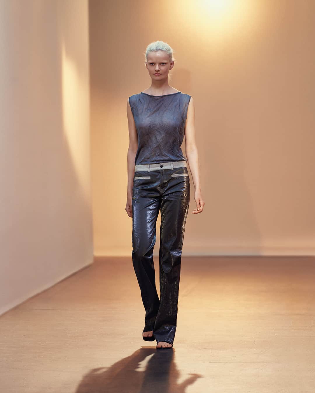 フィリッパコーのインスタグラム：「The Filippa K SS24 collection juxtaposes references rooted in time with fabrics that carry the lustre of the future. Trousers appear in raw linen with a metallic coating that gives it a vinyl-like sheen, while tank tops and dresses have been rendered in a crinkled yet soft steel-viscose blend, offering an almost industrial, tactile quality.   Photographed by @timothyschaumburg Styled by @ondineazoulay Make-up by @_georginagraham_ Hair by @ramoneyluv Set design by @florinemilie Models: @bo.exters, @chunjincj, @antematz, Tim Prause #FilippaK #FilippaKSS24」