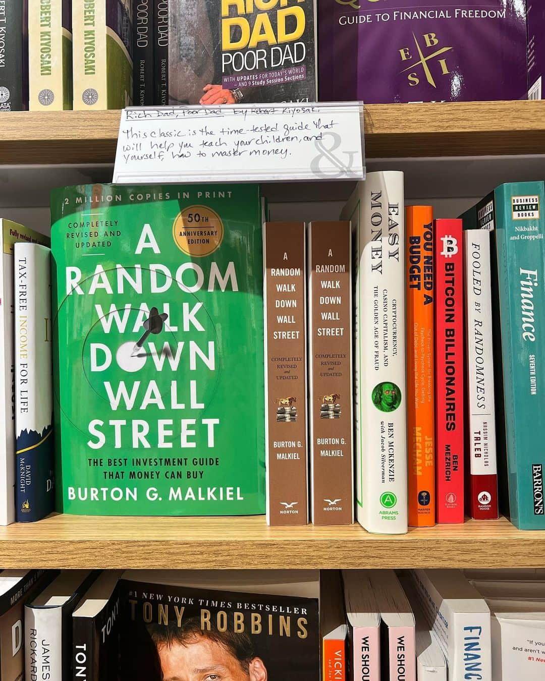 ベンジャミン・マッケンジーのインスタグラム：「“Easy Money” on the @barnesandnoble shelf in BK in the business section. Squeezed between Malkiel (who I read and loved in school) and Nassim Taleb, of Black Swan and Fooled by Randomness fame. May be crying happy tears, none of your business 😭 🤓」