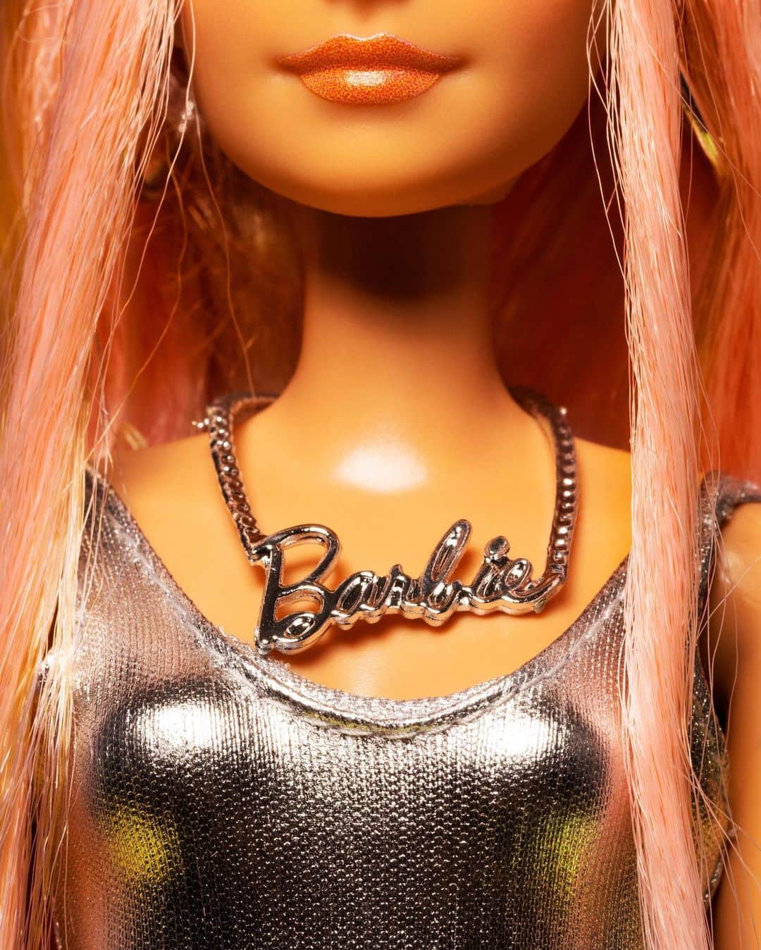 のインスタグラム：「Practically everything in Barbie’s tiny plastic world bears her unmistakable signature. How? It’s all about the visuals.  Barbie has a unified look that goes beyond the color pink. There’s her hair, her feet, her portfolio of properties and her fleet of automobiles. There are her impossible proportions, which would give her torso room for only half a liver. Perhaps her ultimate accessory is her boyfriend, Ken.  According to Mattel, more than 100 Barbie dolls are sold every minute, and quite a few minutes have elapsed since Barbie made her debut, at a toy industry trade show, in 1959. Just as remarkable as the ways the doll has changed since then are the ways it hasn’t. Like the characters on “Sesame Street” or “South Park,” Barbie exists alongside us without quite aging with us — reflecting our times, but not our wrinkles.  That adaptive consistency may play a role in maintaining her cultural ubiquity (alongside her literal ubiquity), for while the things that make Barbie Barbie may get a face lift every few years, her DNA remains unchanged.  Browse a visual dictionary of Barbie’s iconic style at the link in bio. Photo illustrations by @elizabethrenstrom」