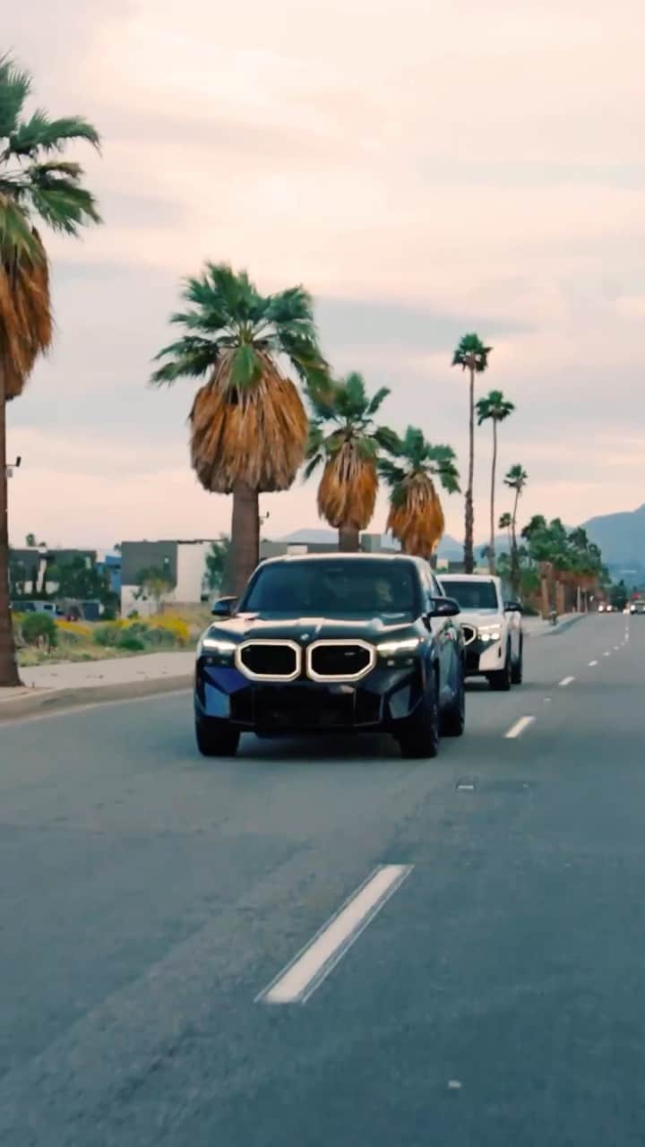 BMWのインスタグラム：「Don’t wait to tick off that bucket list ✈️🌴 The BMW XM . #BMWXM #BMW #BMWM  __ BMW XM : Combined fuel consumption, weighted: 1.6–1.4 l/100 km. Combined power consumption, weighted: 35.8–32.9 kWh/100 km. Combined CO2 emissions, weighted: 36–32 g/km. All data according to WLTP. Further info: www.bmw.com/disclaimer」